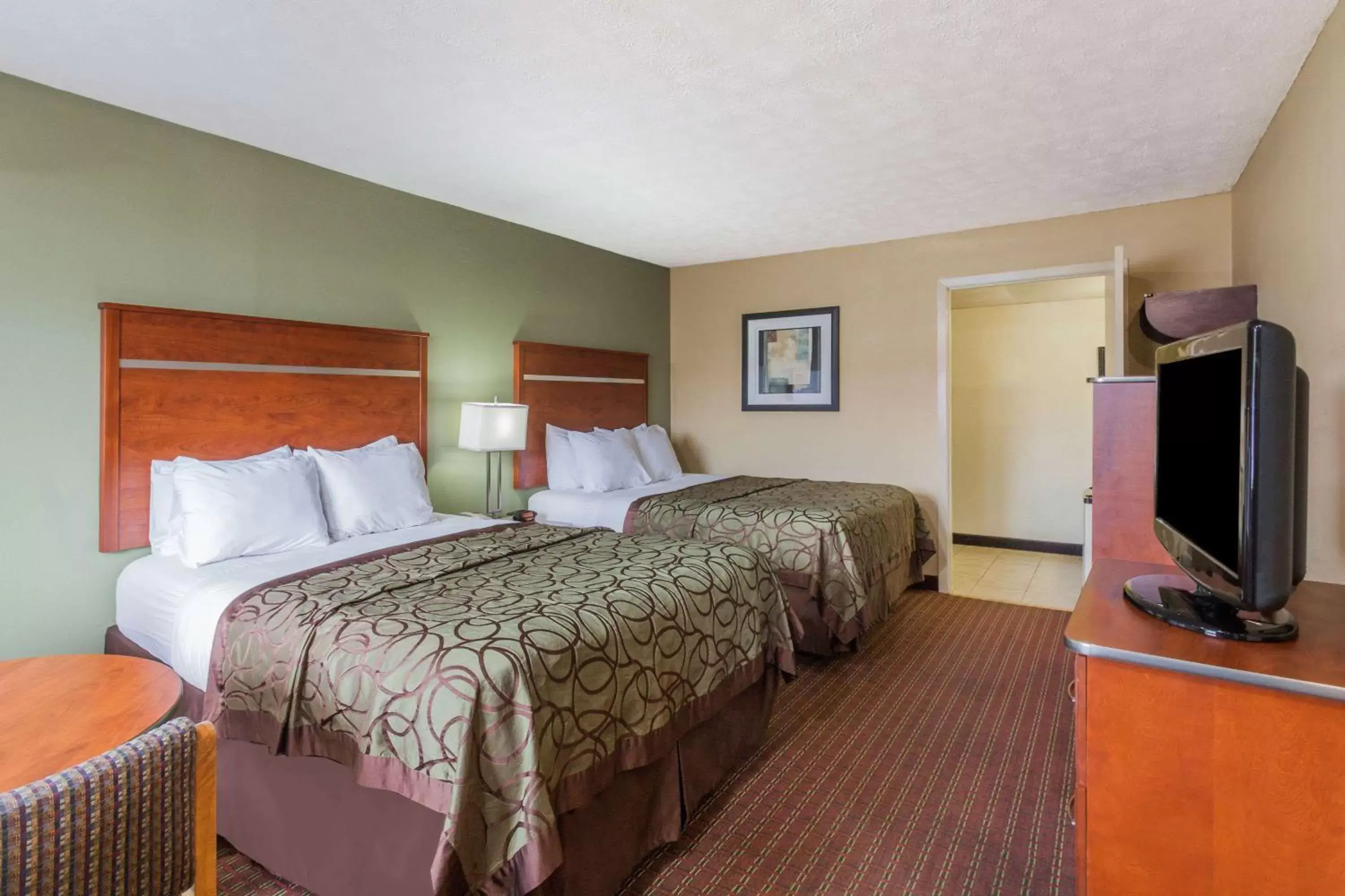 Photo of the whole room, Bed in Baymont by Wyndham Pigeon Forge near Island Drive