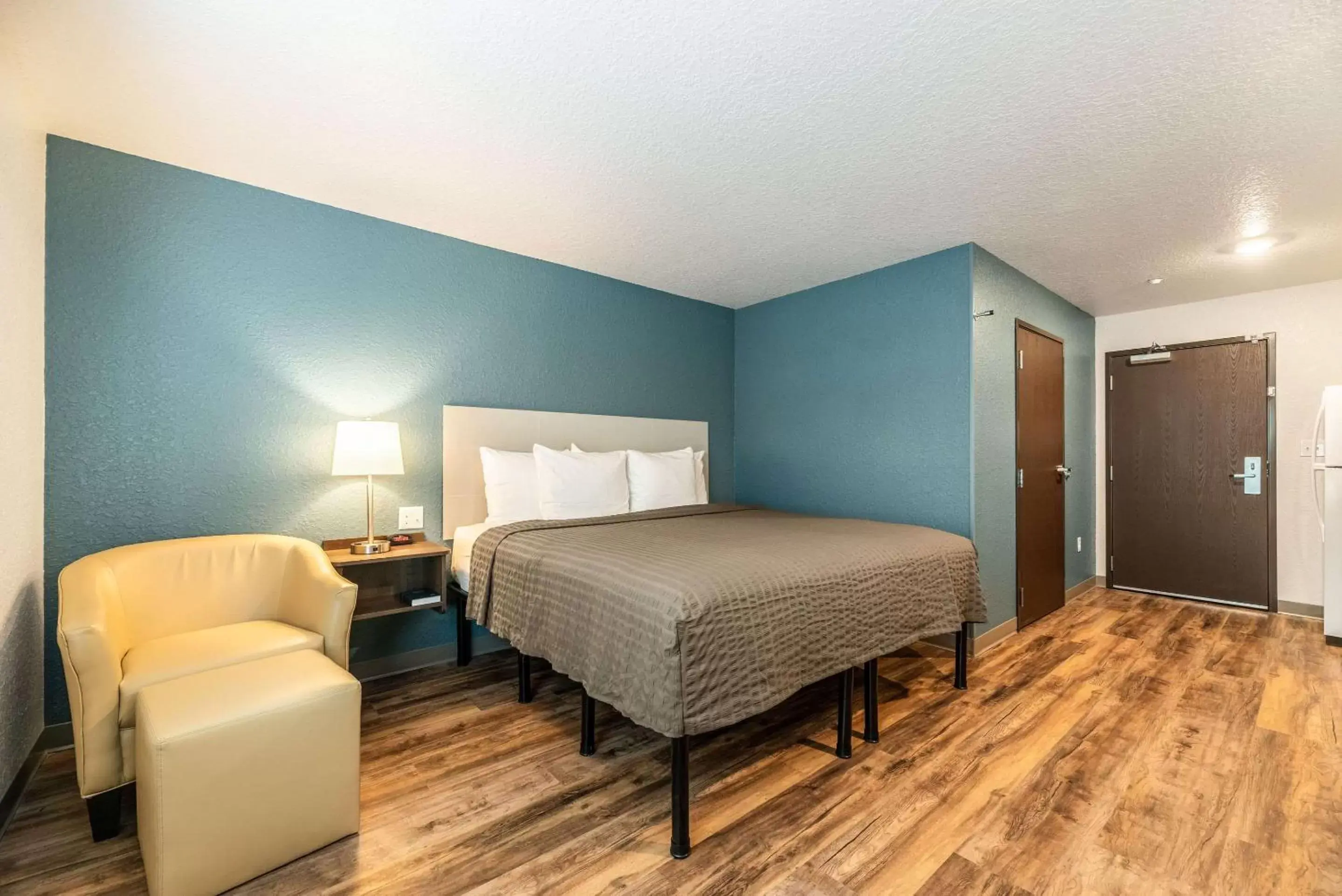 Photo of the whole room, Bed in WoodSpring Suites Sanford North I-4 Orlando Area