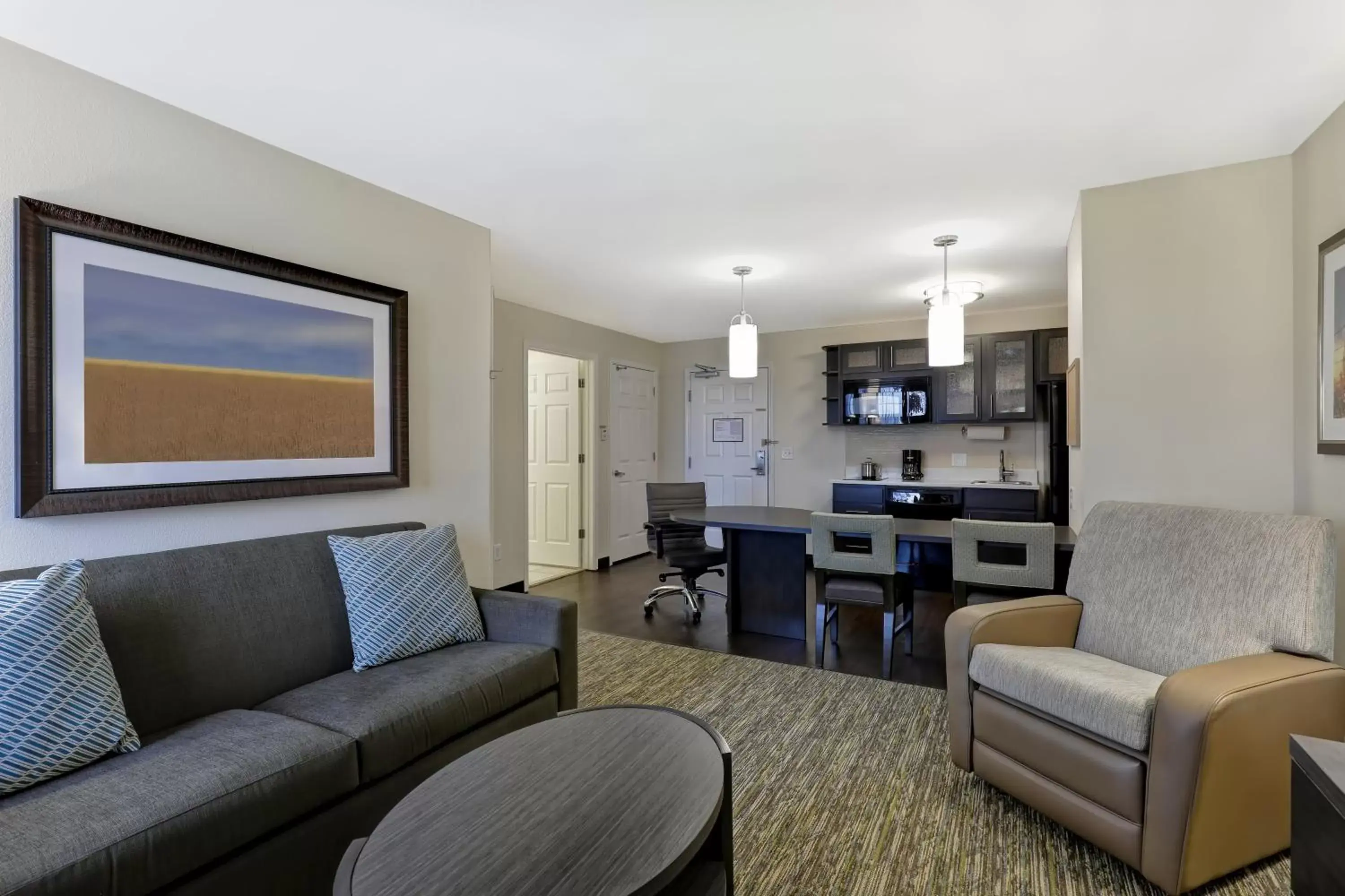 Bedroom, Seating Area in Candlewood Suites Indianapolis - South, an IHG Hotel