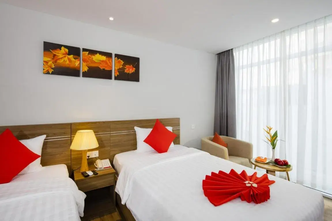 Bed in Maple Leaf Hotel & Apartment