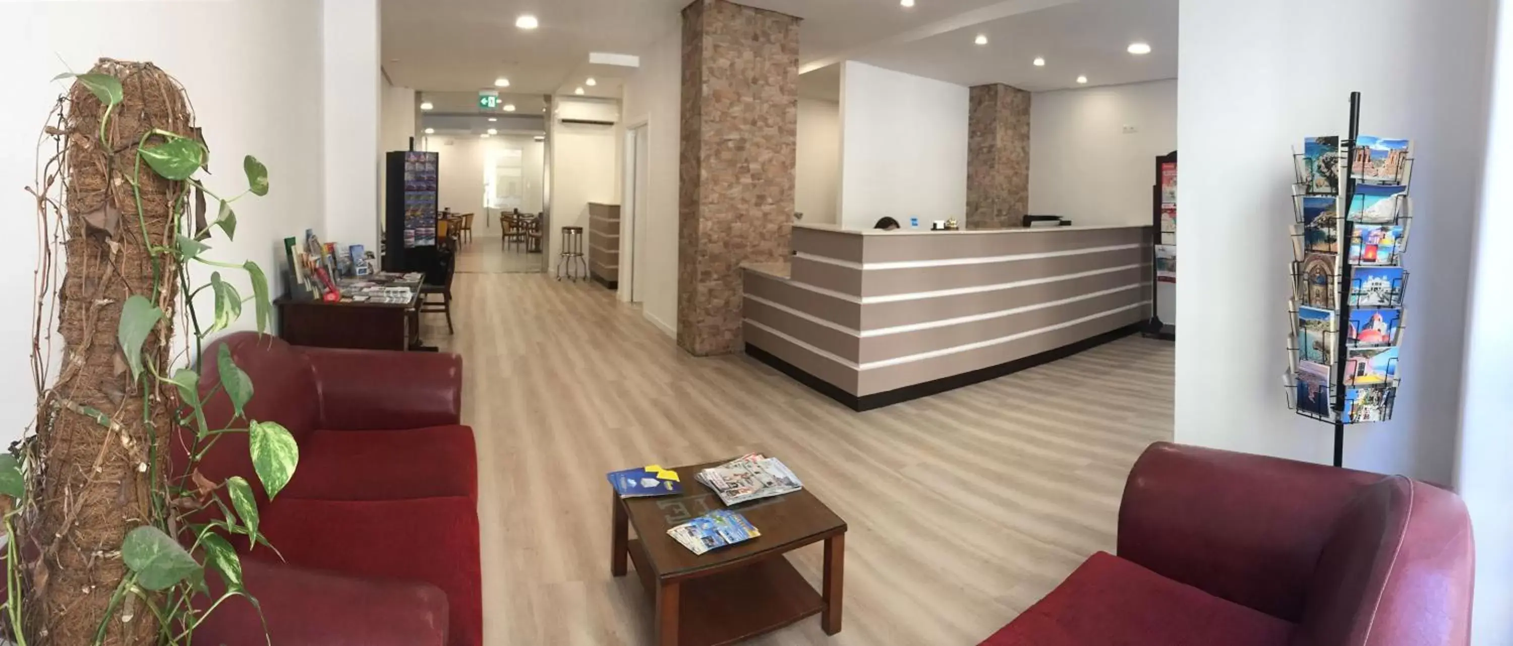 Communal lounge/ TV room, Lobby/Reception in Hotel Elite