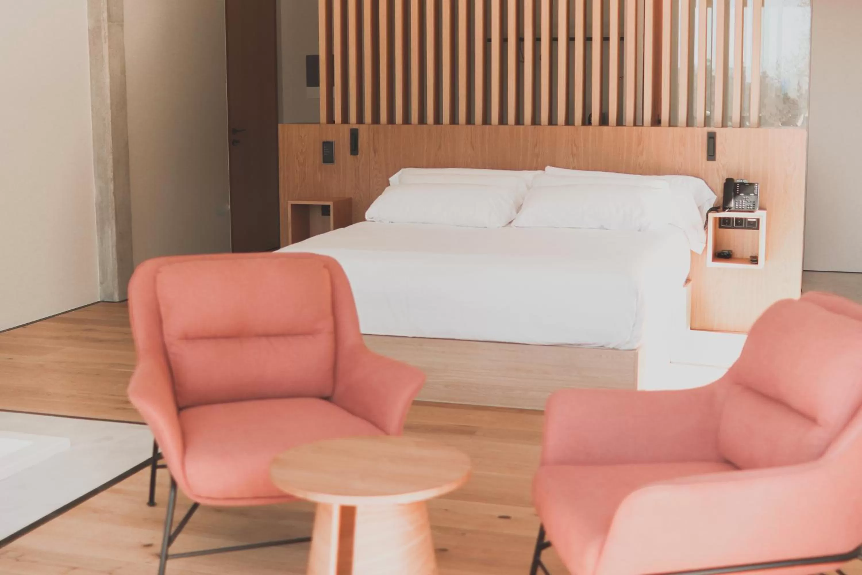 Bed in Atmos Hotel Boutique