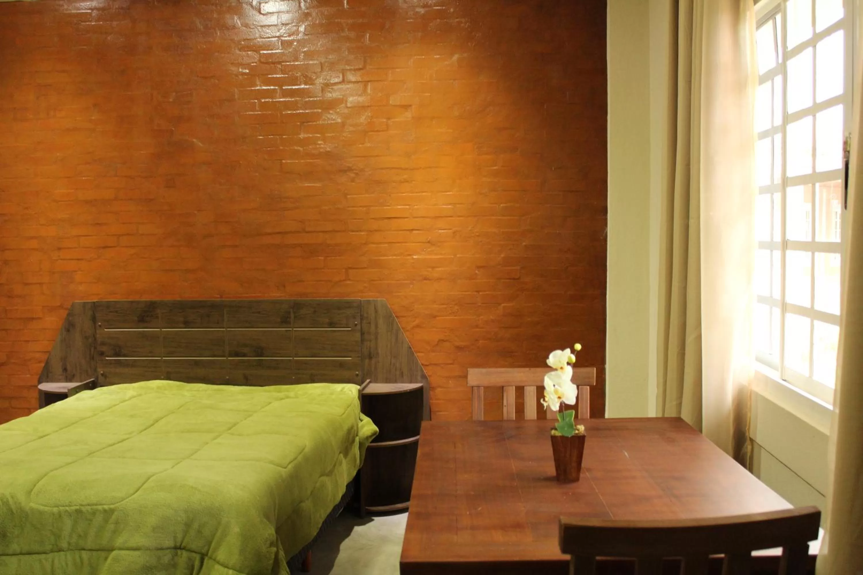 Bed in Pousada Morro dos Ventos