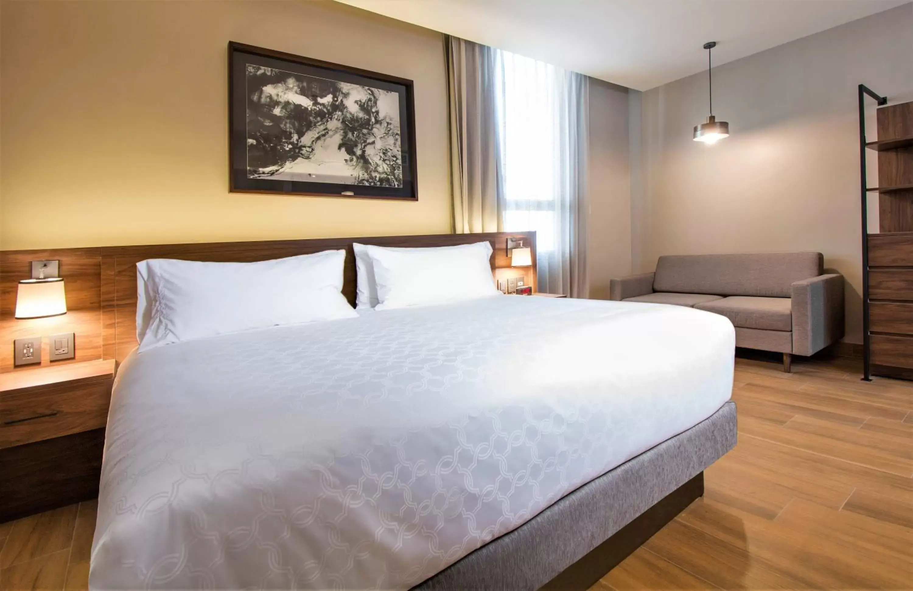 Photo of the whole room, Bed in Staybridge Suites - Guadalajara Novena, an IHG Hotel