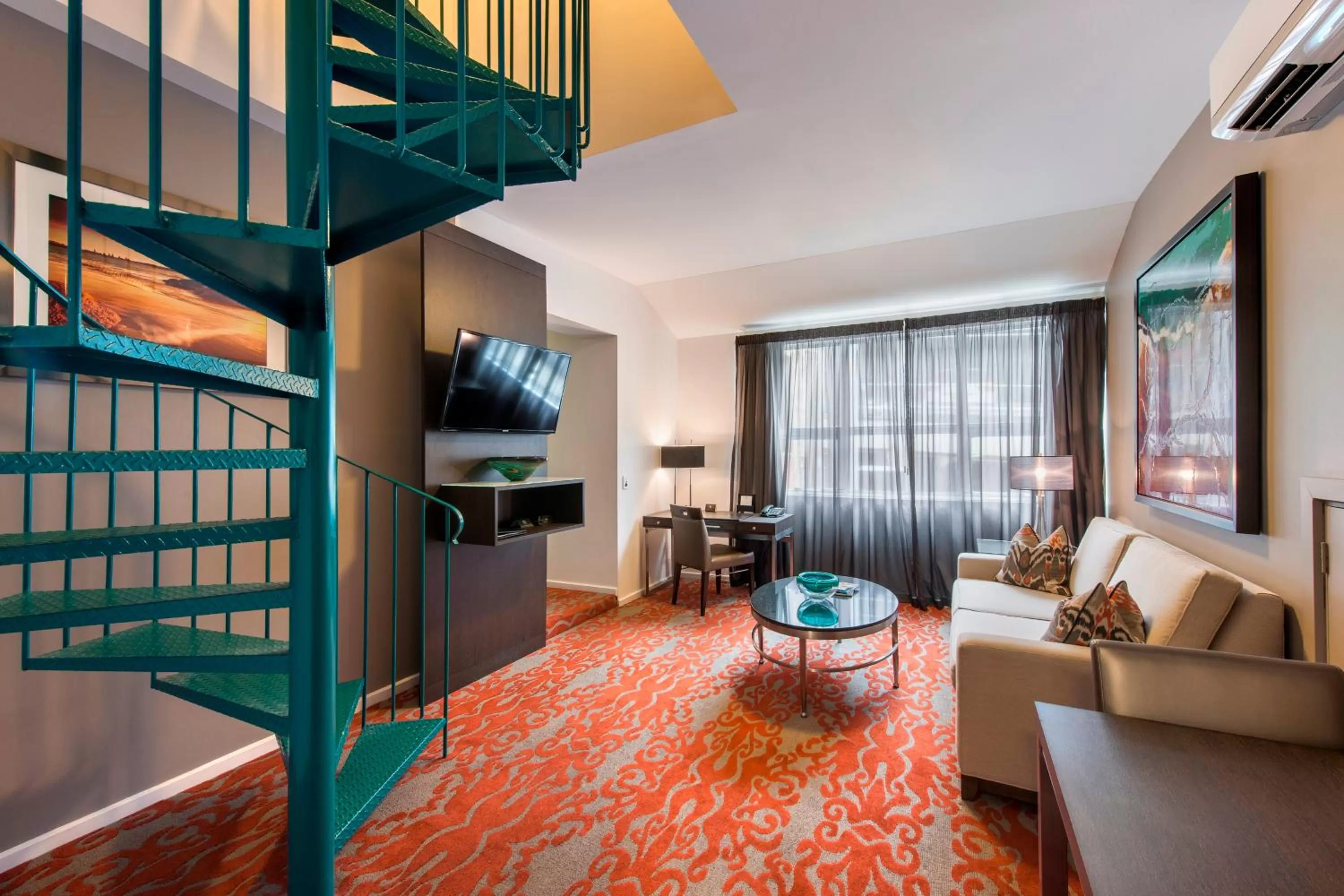 Living room, Bed in Miller Apartments