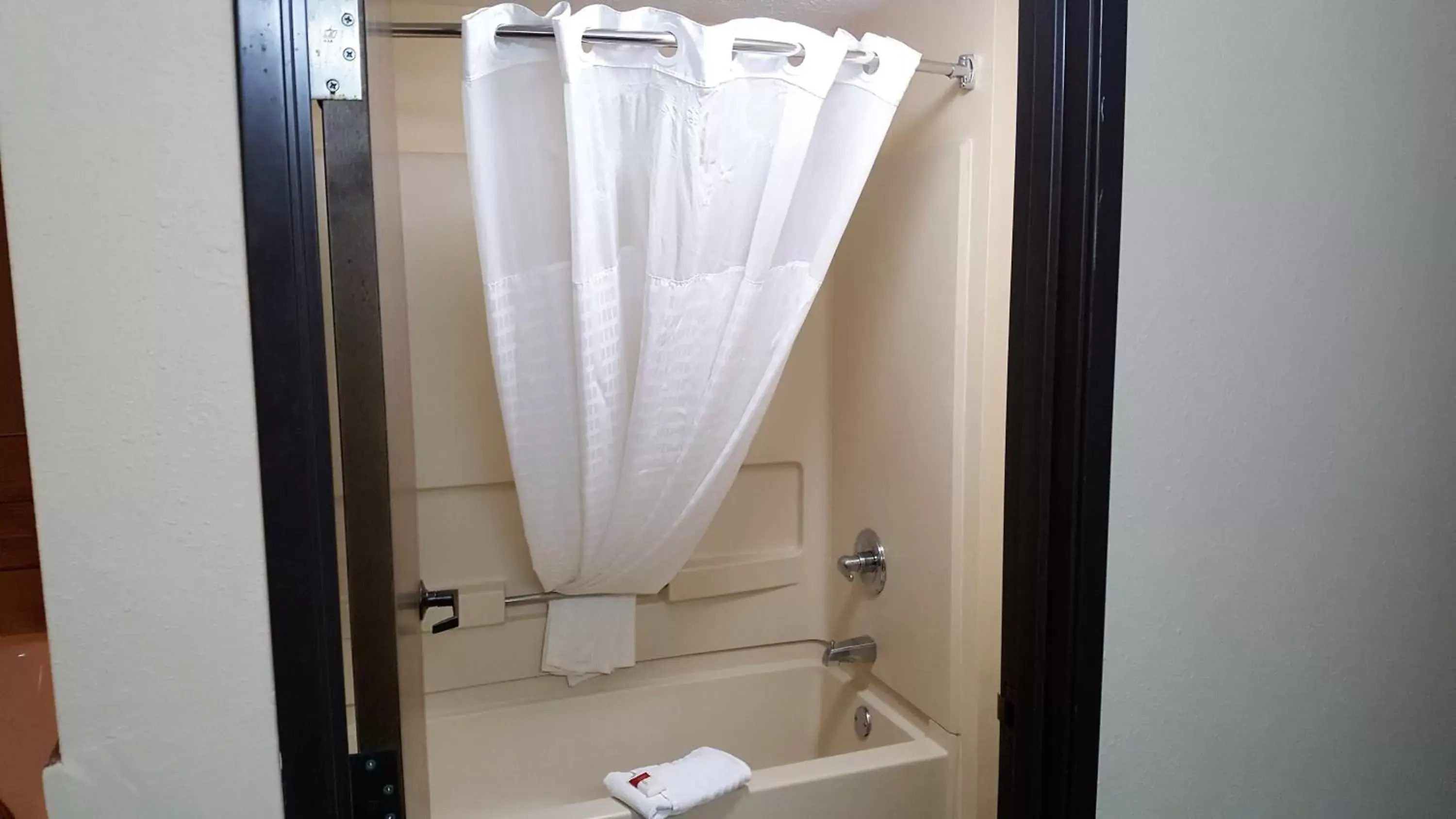 Bathroom in Baymont by Wyndham Belleville Airport Area Free Airport Shuttle