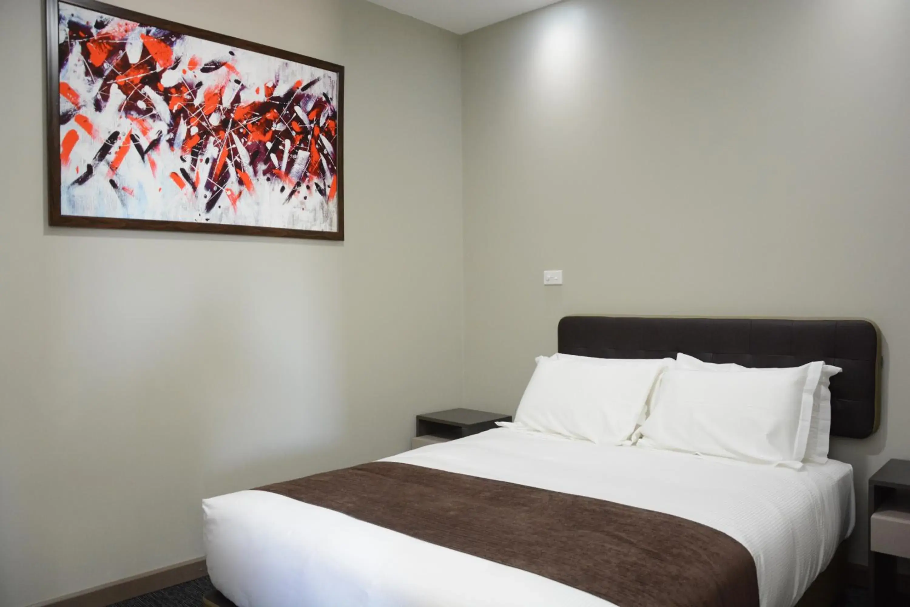 Bed in Ratsun Nadi Airport Apartment Hotel