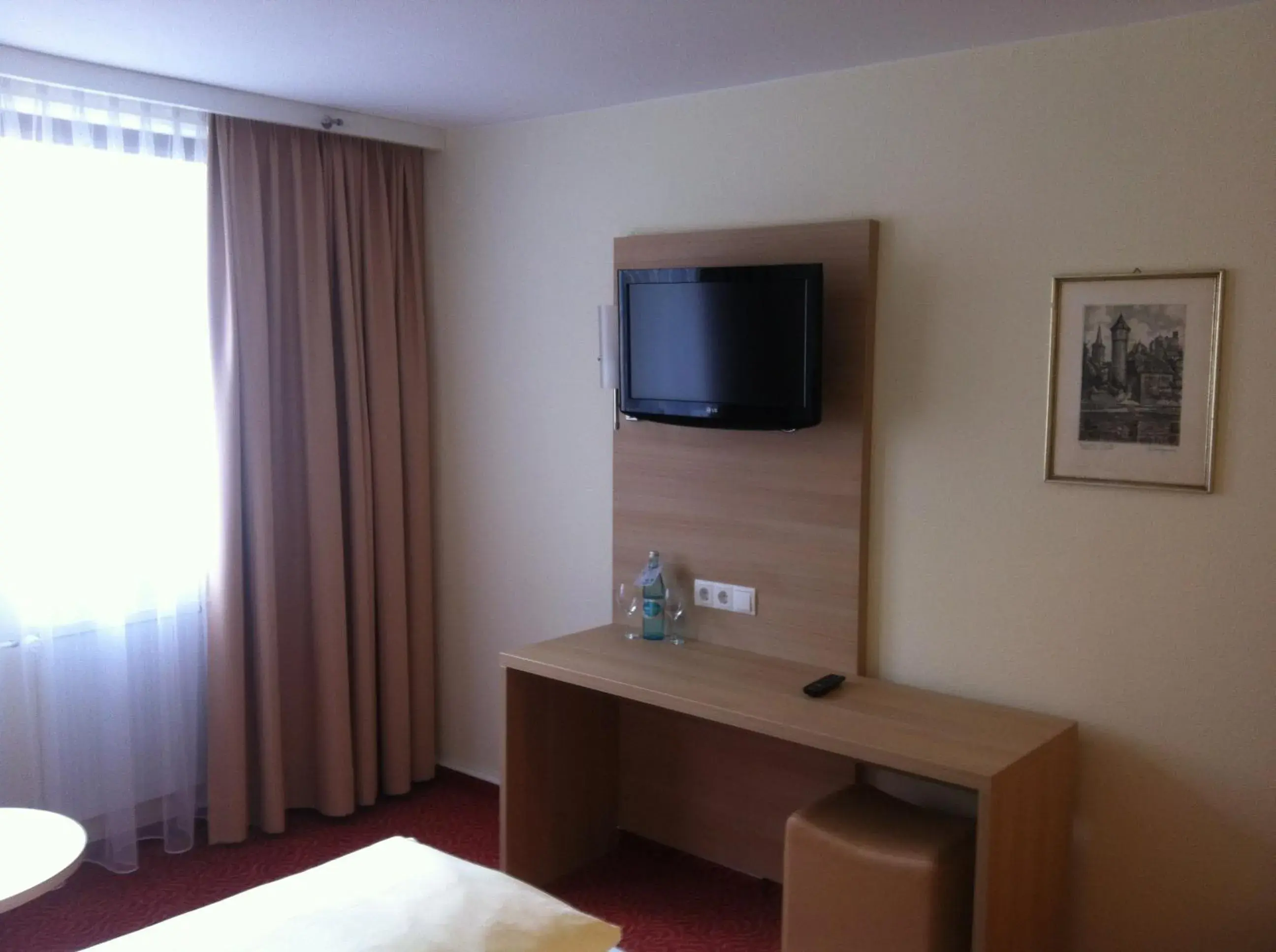 TV and multimedia, TV/Entertainment Center in Tauberhotel Kette