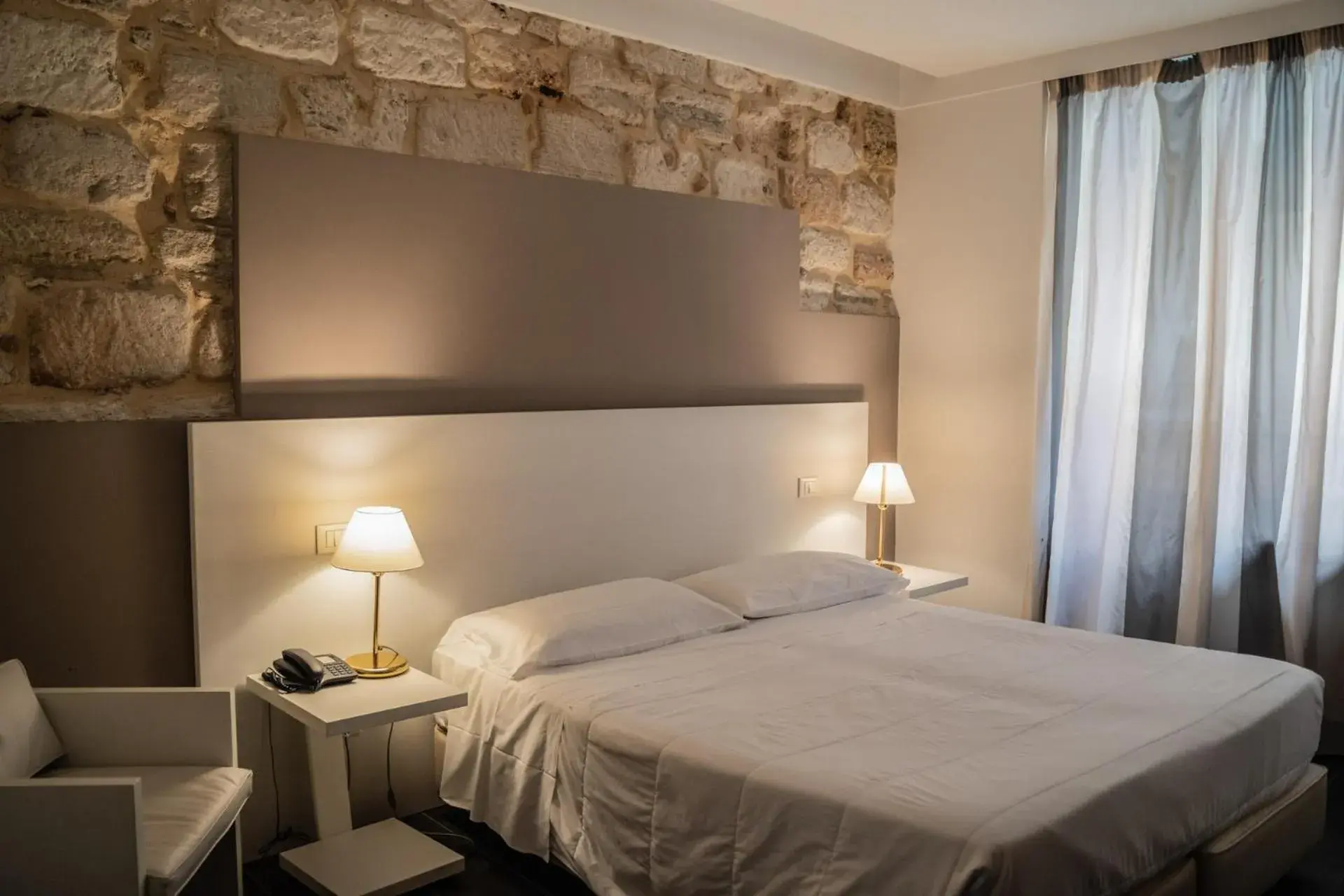 Bed in Hotel Mediterraneo