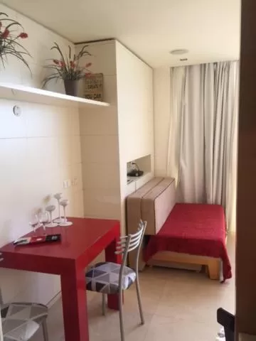 Dining area, Bed in Raphael Apartments