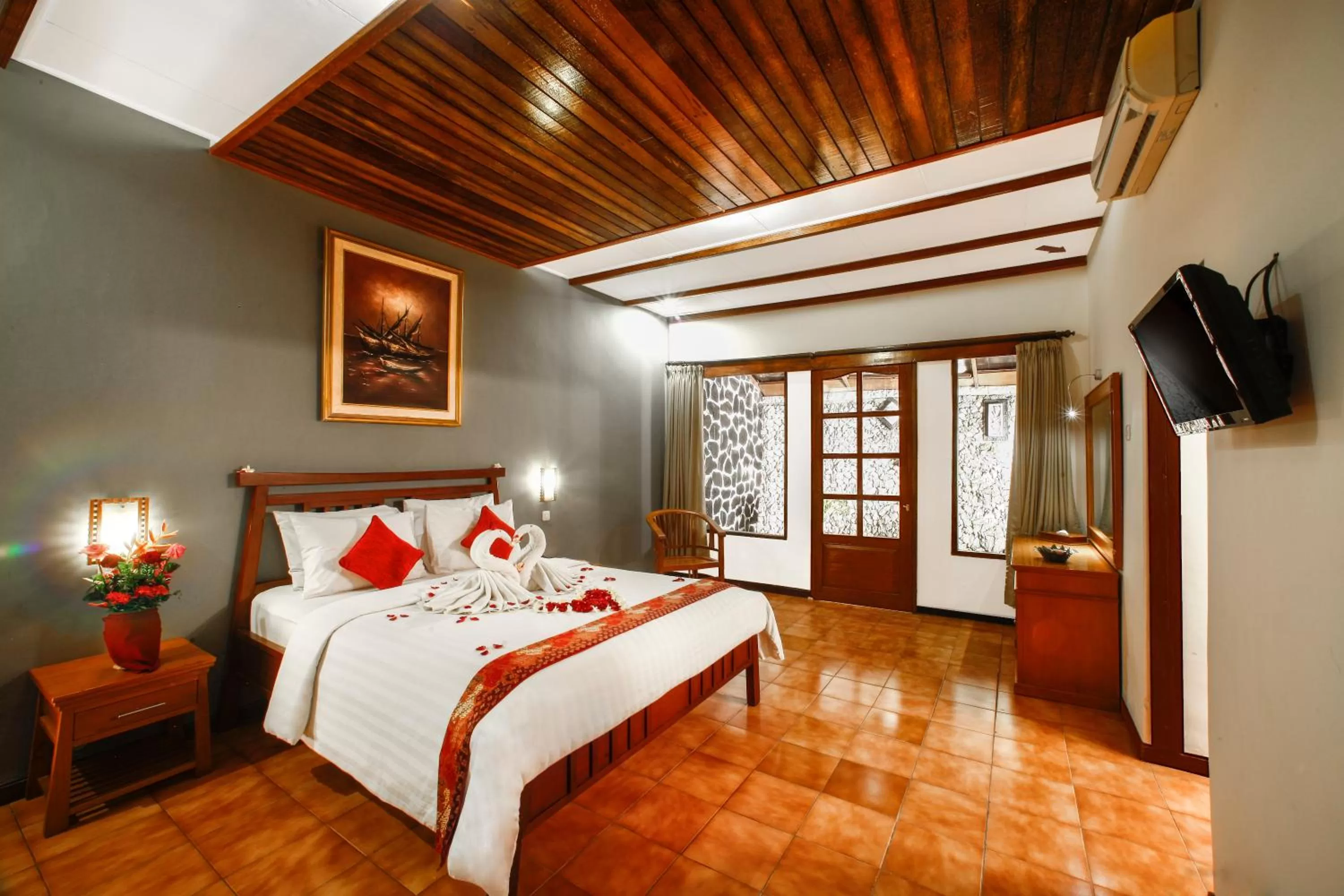 Photo of the whole room, Bed in Bali Taman Beach Resort & Spa Lovina