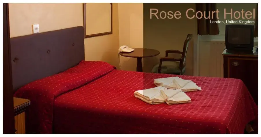 Bed in Rose Court Hotel