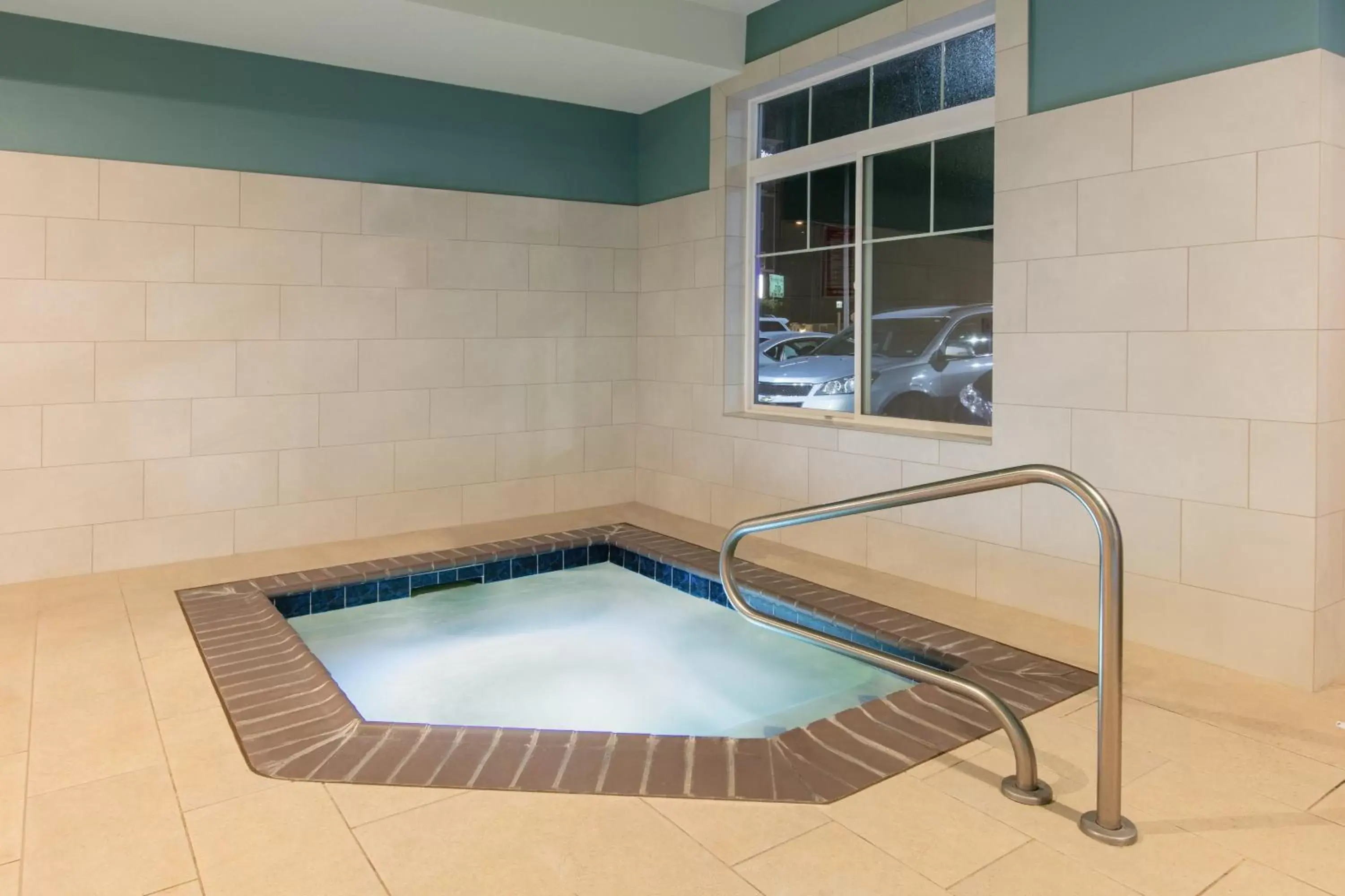 Swimming Pool in Holiday Inn Express Hotel & Suites Seaside Convention Center, an IHG Hotel