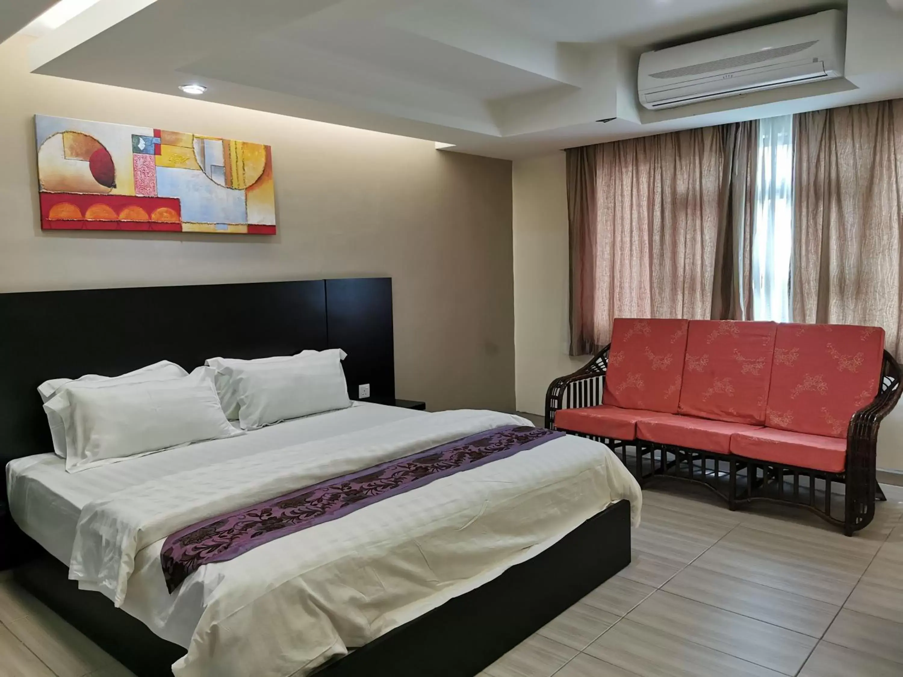 Bed in Melang Inn
