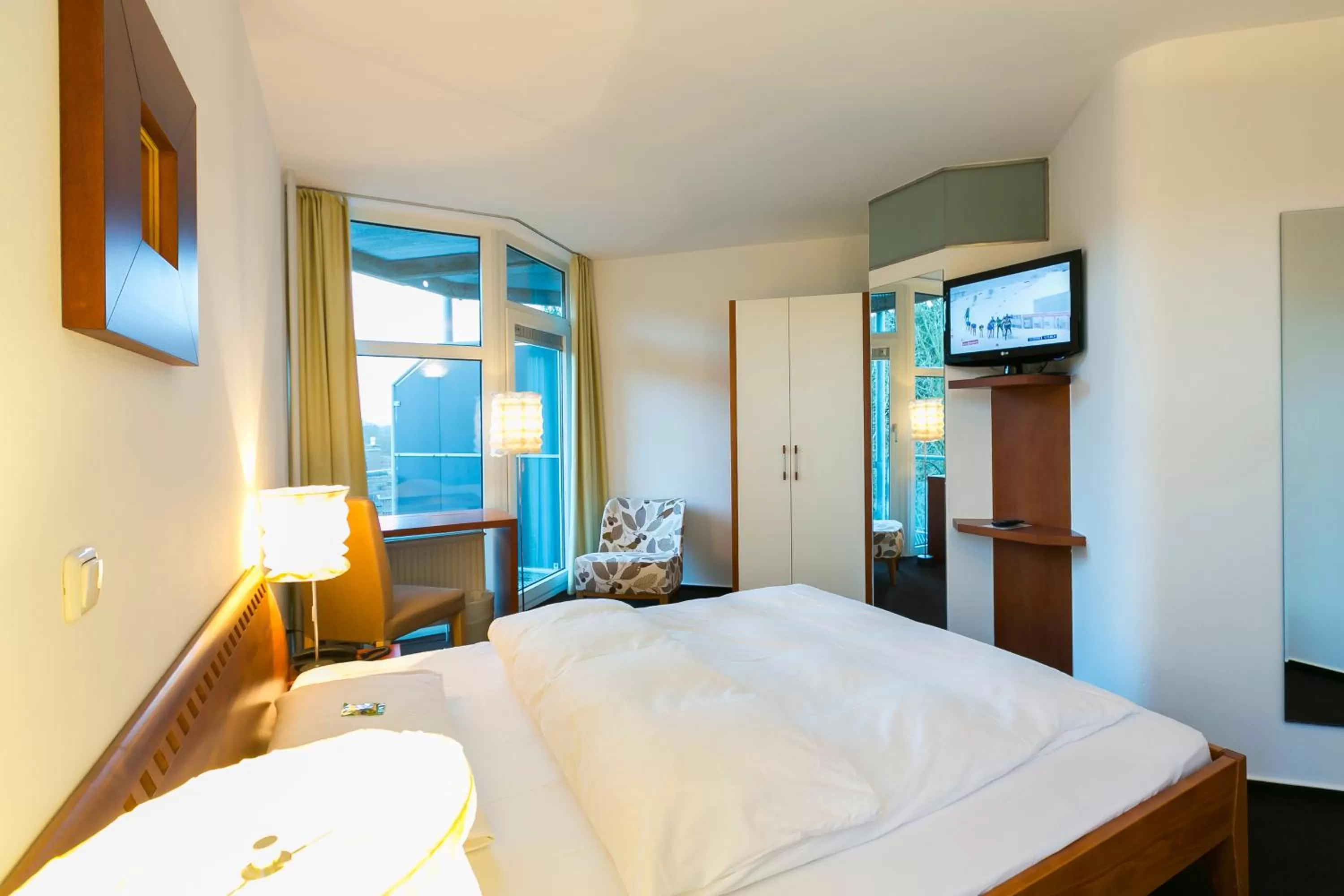 Photo of the whole room, Bed in Wald & Golfhotel Lottental