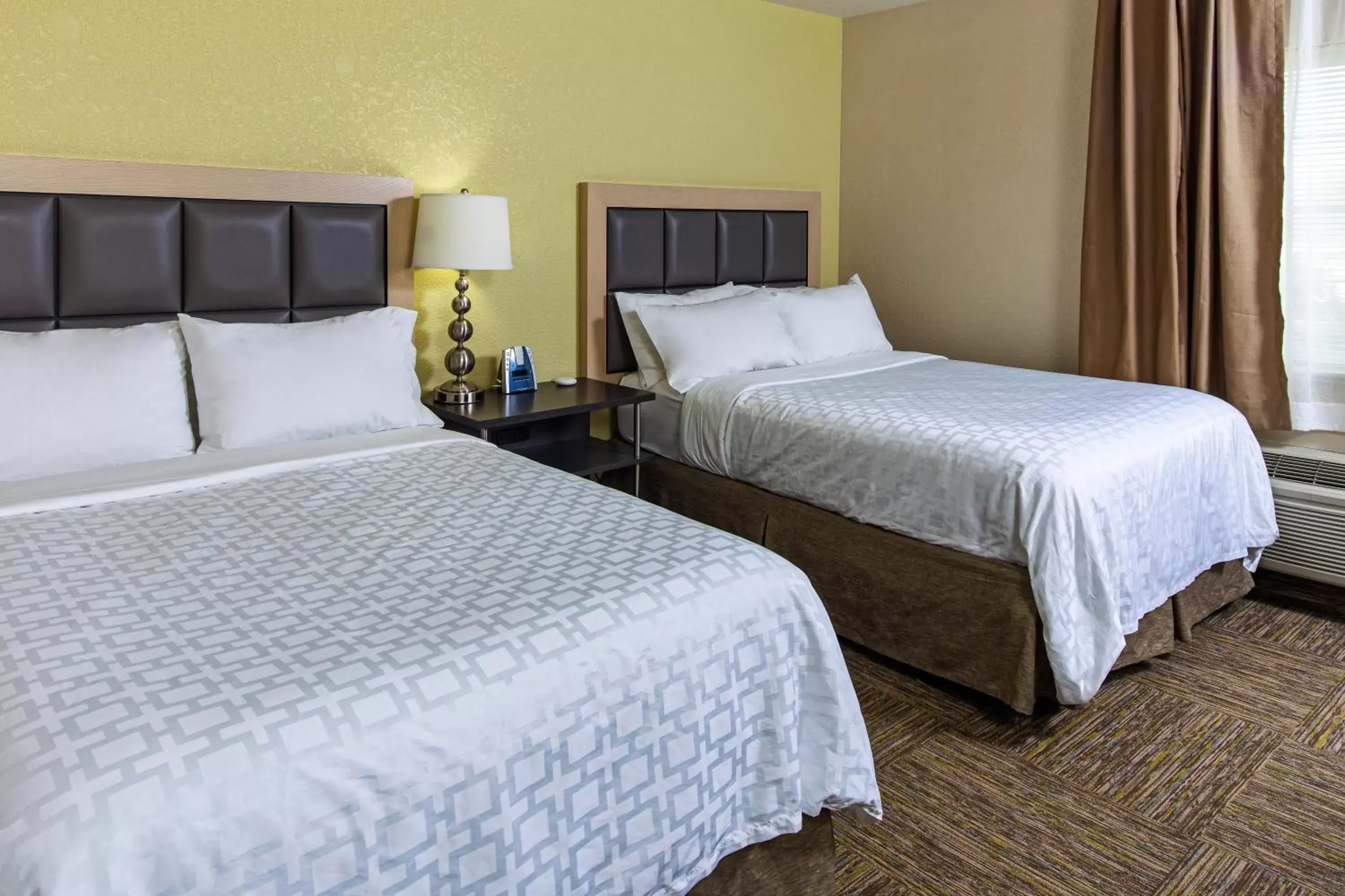 Photo of the whole room, Bed in Candlewood Suites Appleton, an IHG Hotel