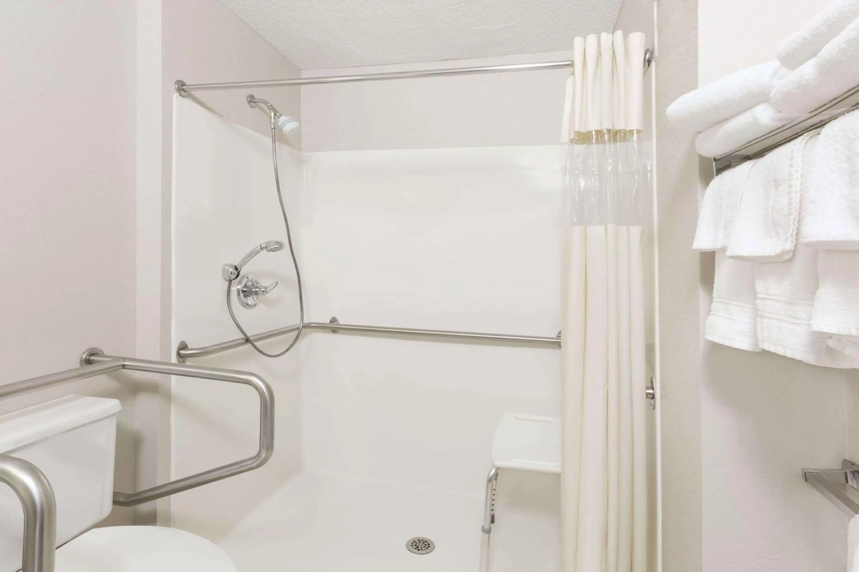 Bathroom in Days Inn & Suites by Wyndham Des Moines Airport