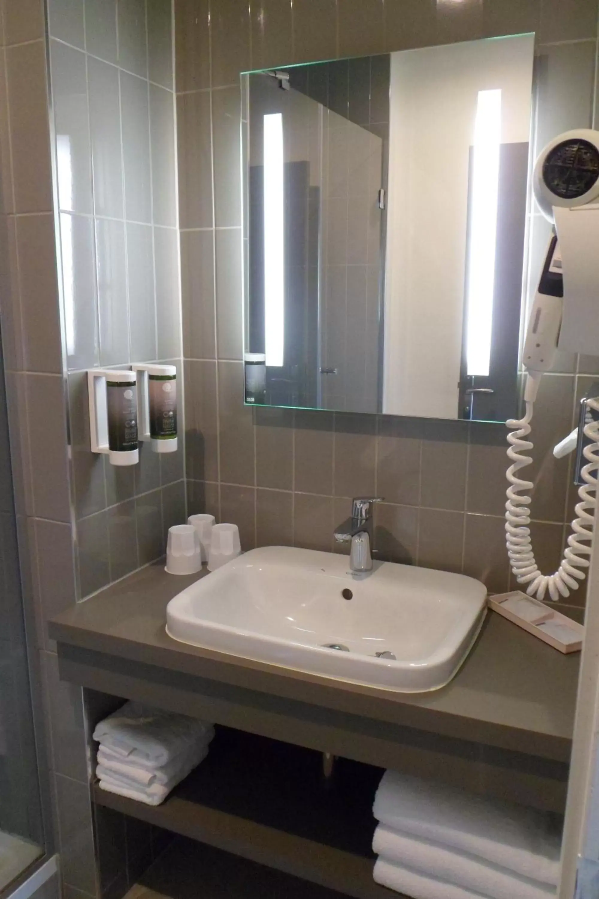 Bathroom in Holiday Inn Paris Opéra - Grands Boulevards, an IHG Hotel