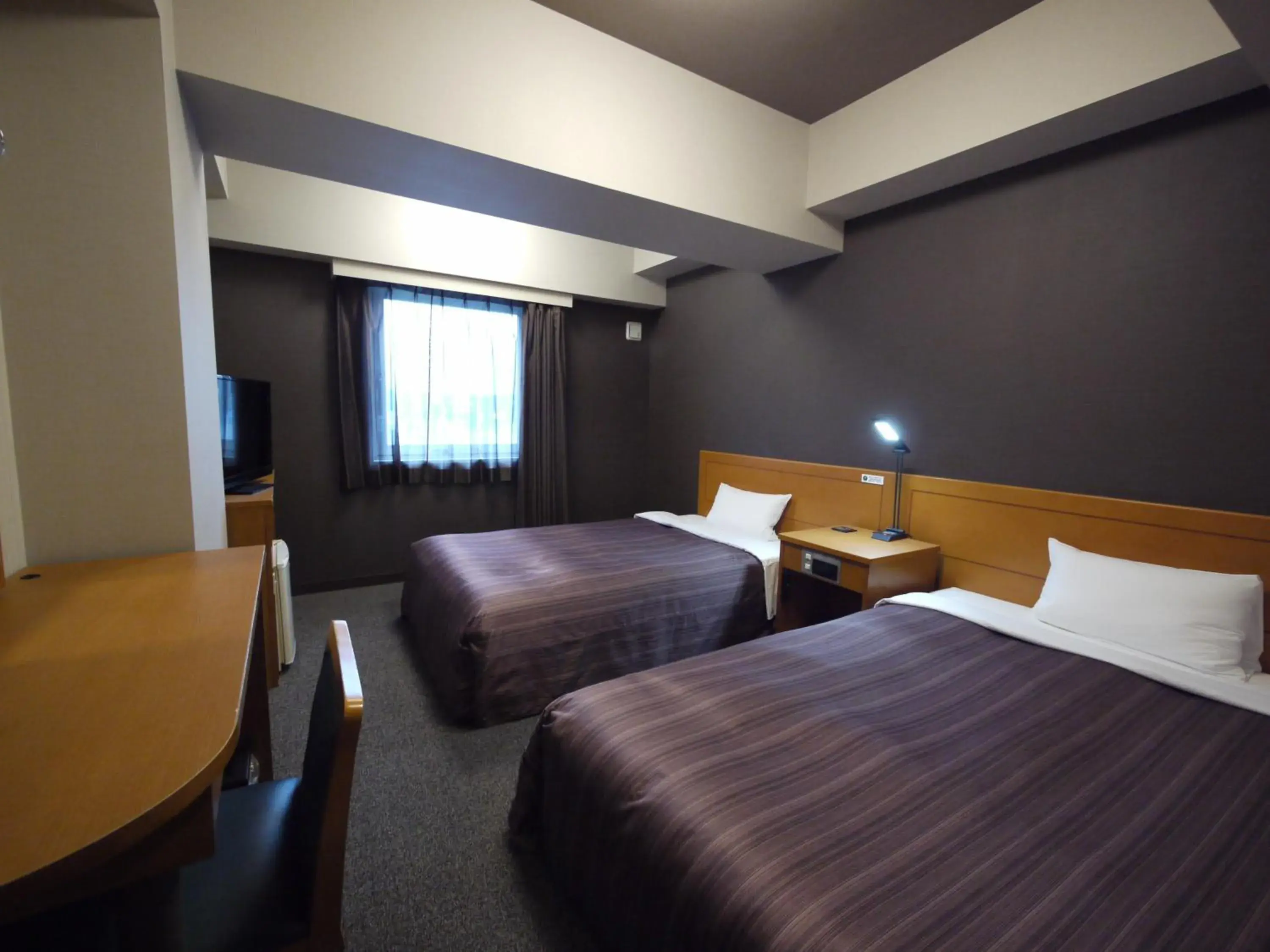 Bed in Hotel Route-Inn Omaezaki