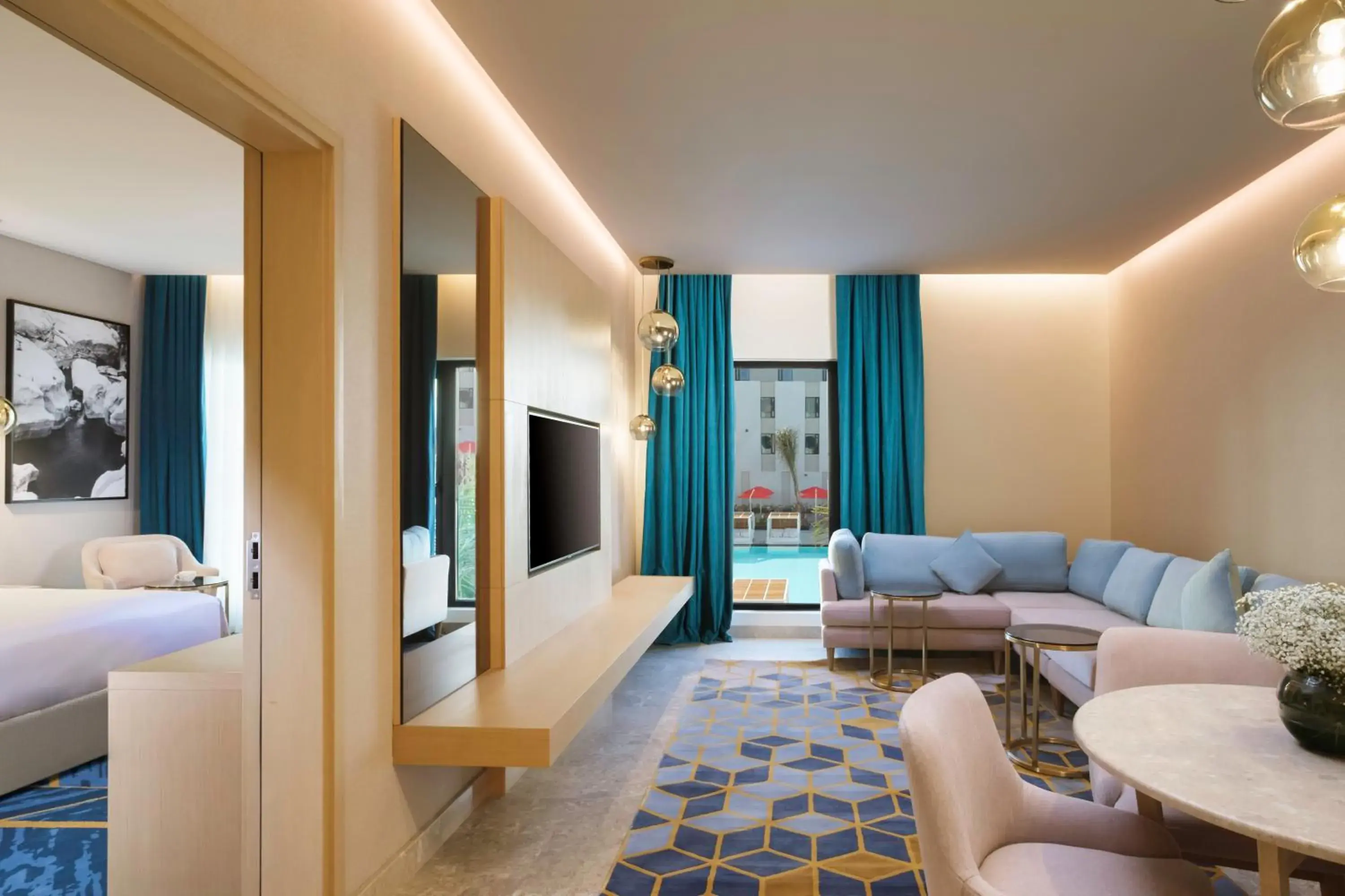 Seating area, Bed in Maani Muscat Hotel & Suites Seating area, Bed in Maani Muscat Hotel & Suites