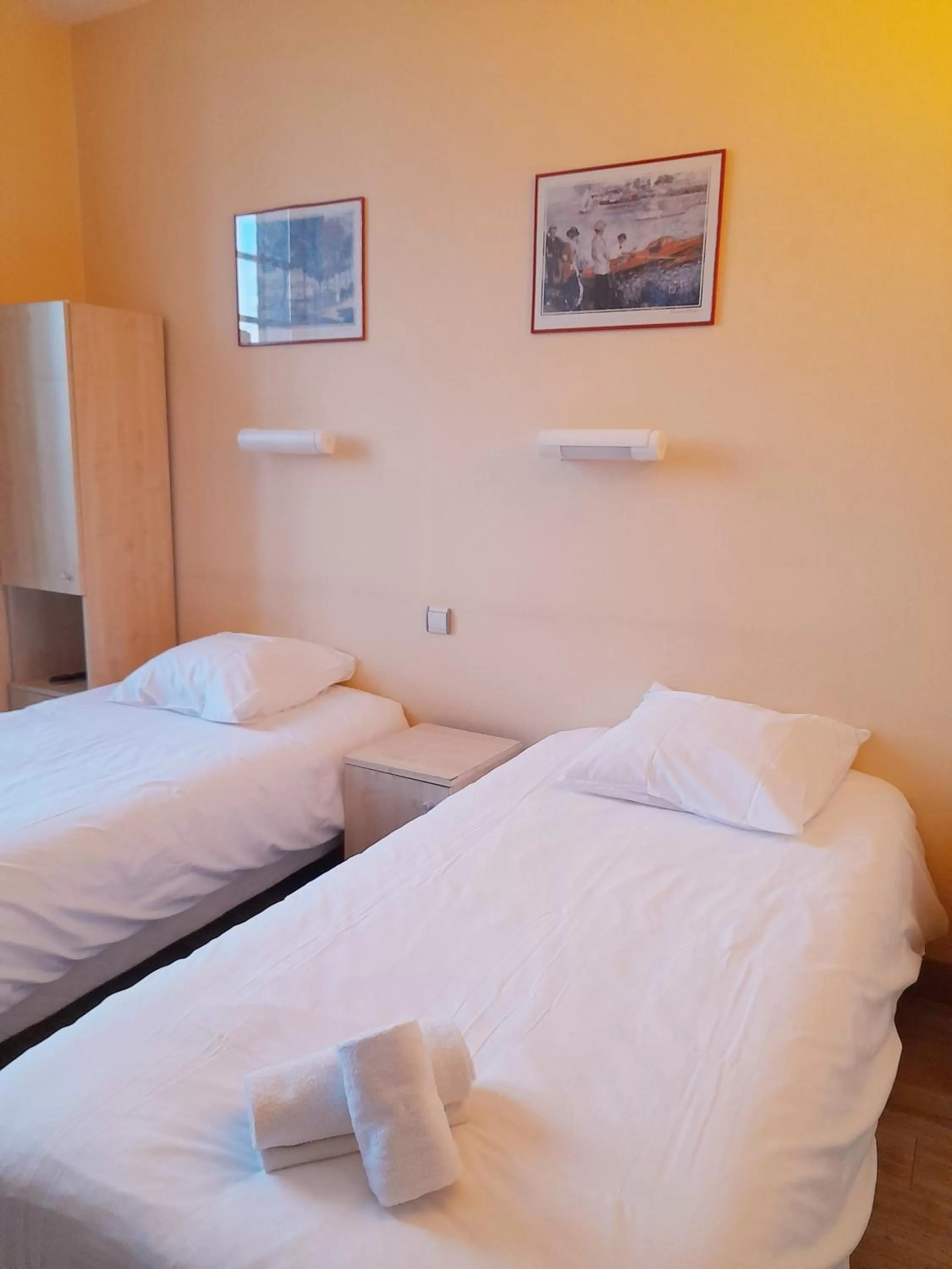 Bed in Hôtellerie Saint Yves