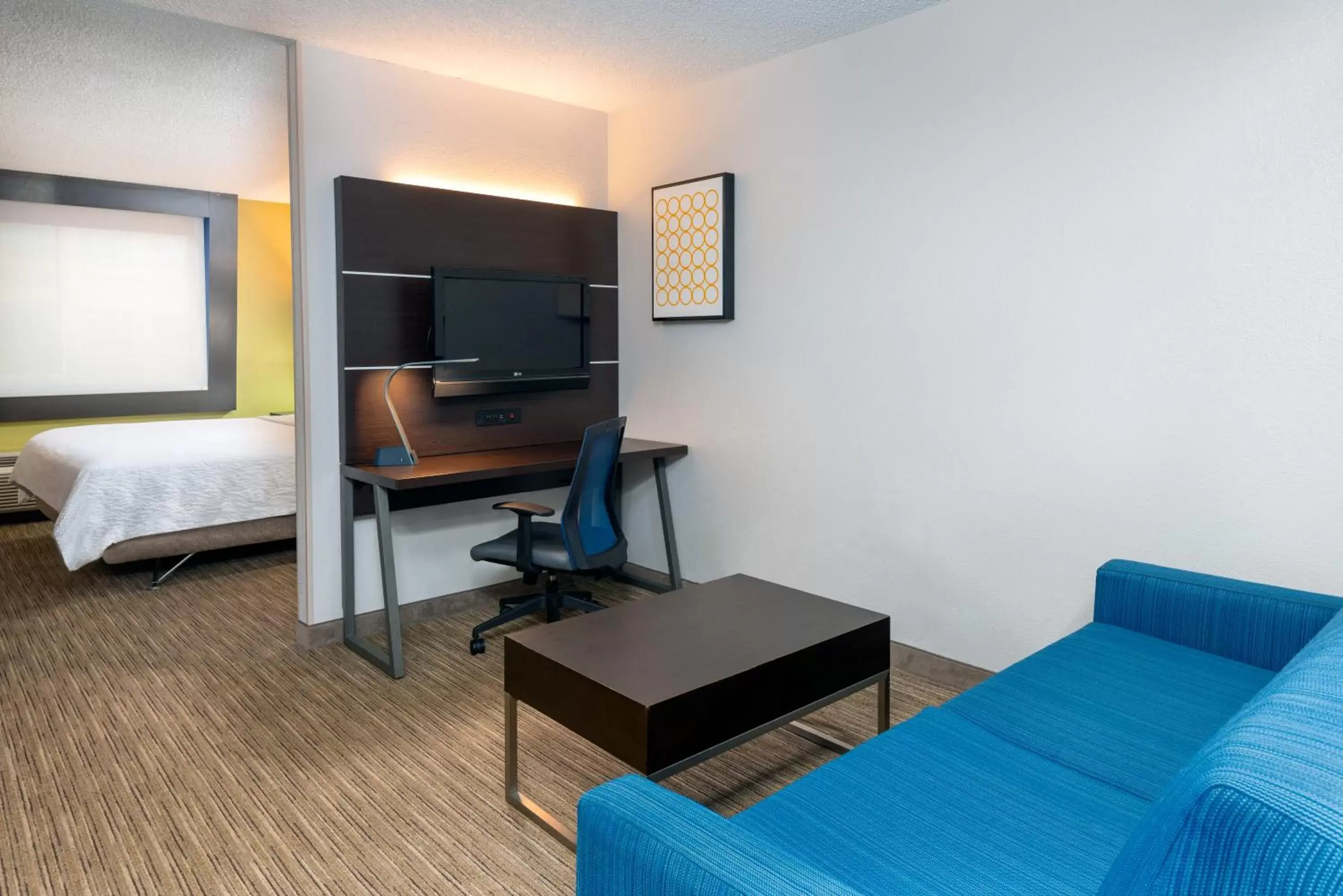 Bed, TV/Entertainment Center in Holiday Inn Express Miami Airport Doral Area, an IHG Hotel