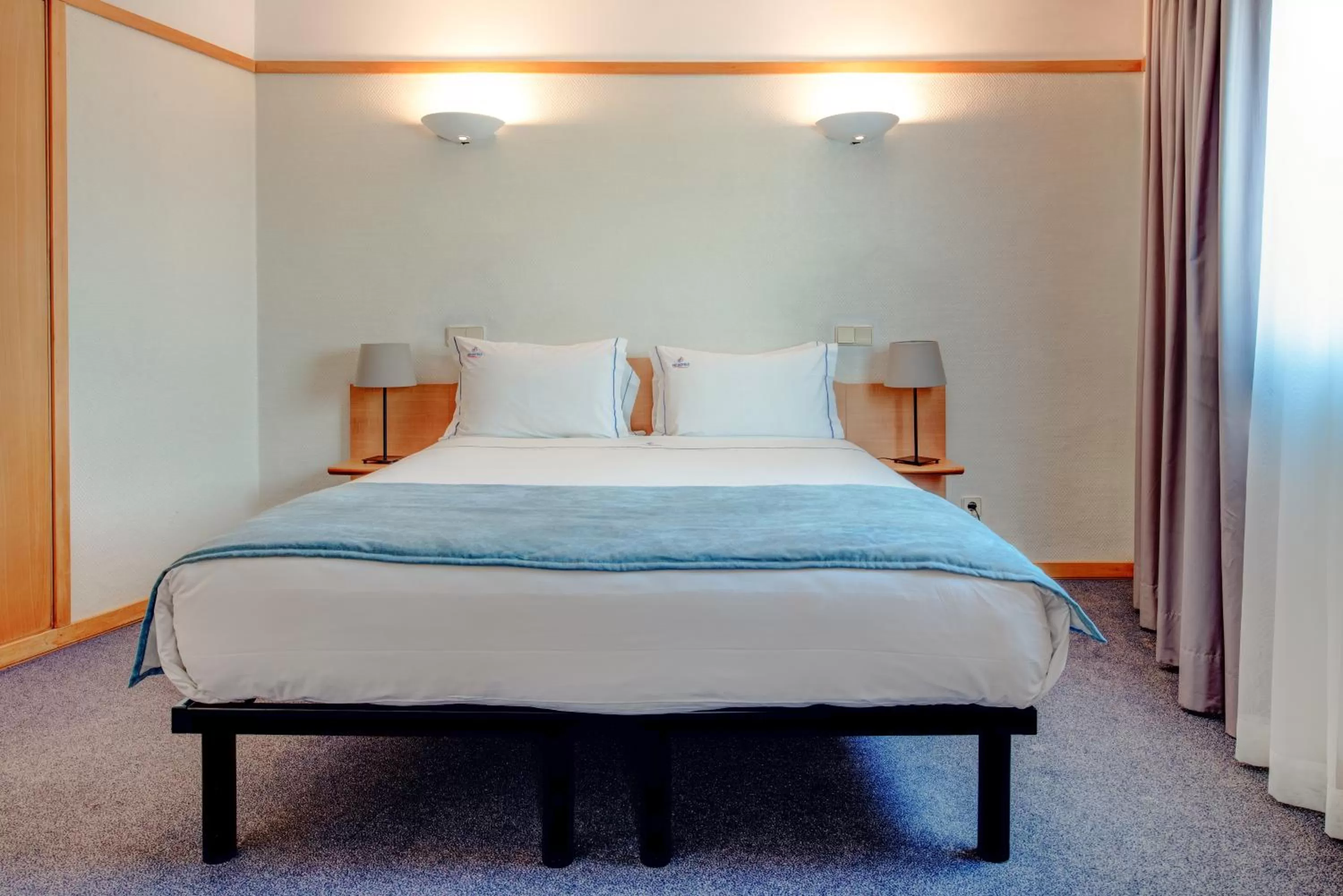 Bed in VIP Executive Eden Aparthotel