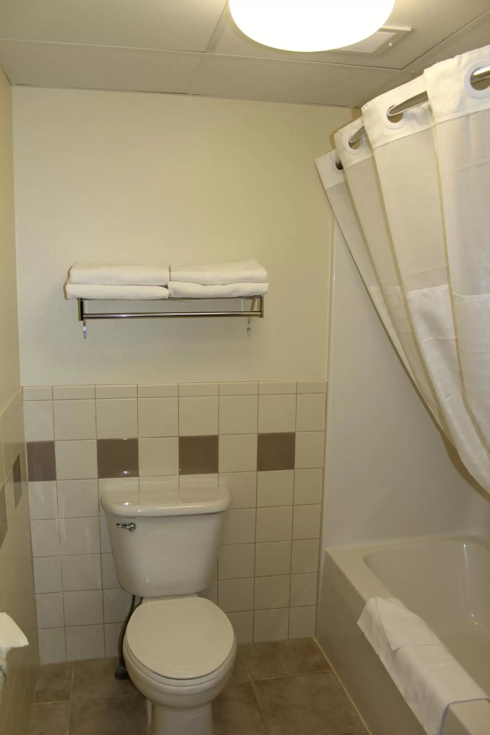 Bathroom in AmericInn by Wyndham Cedar Rapids Airport