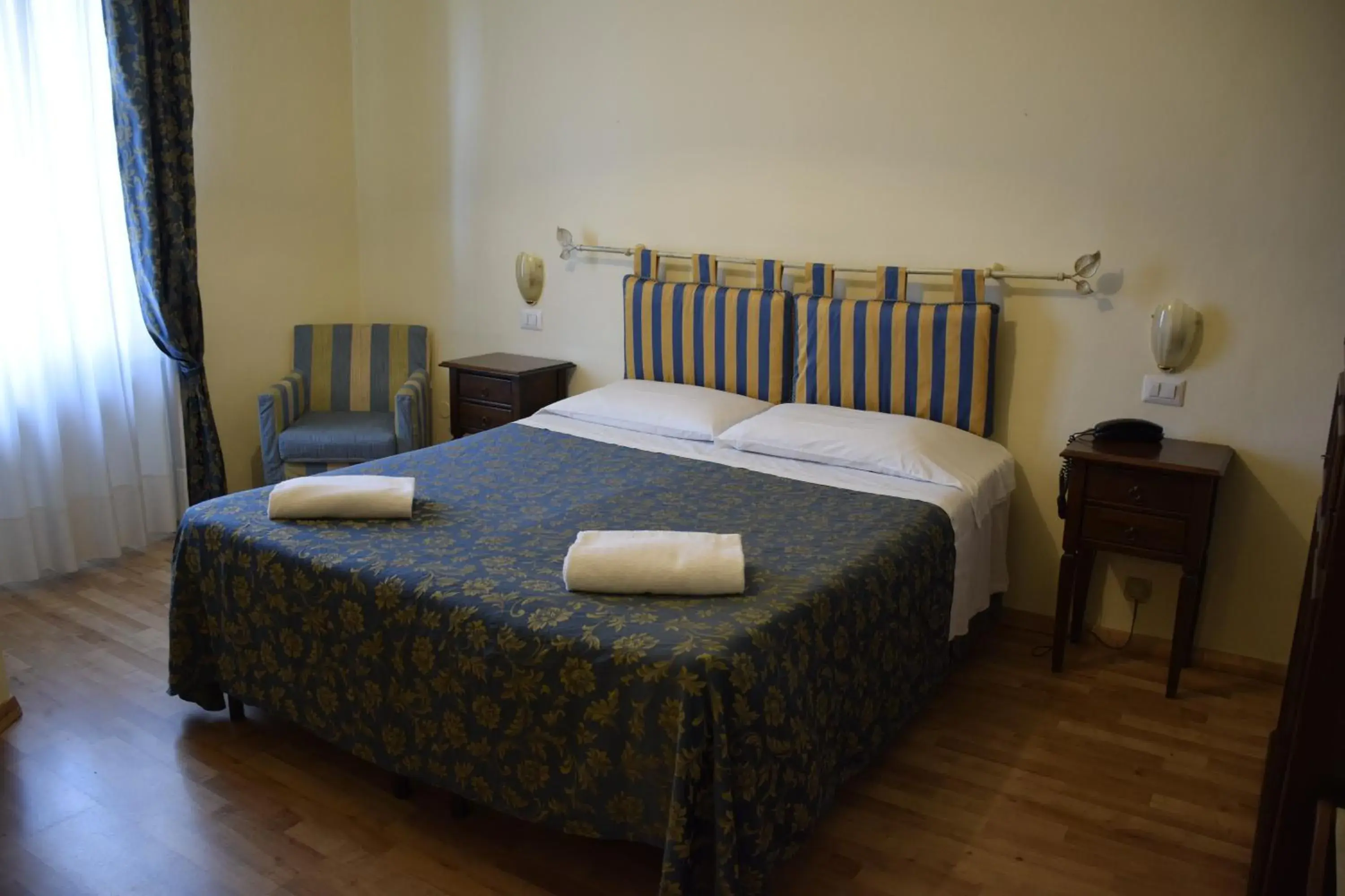 Photo of the whole room, Bed in Hotel Arcobaleno Siena
