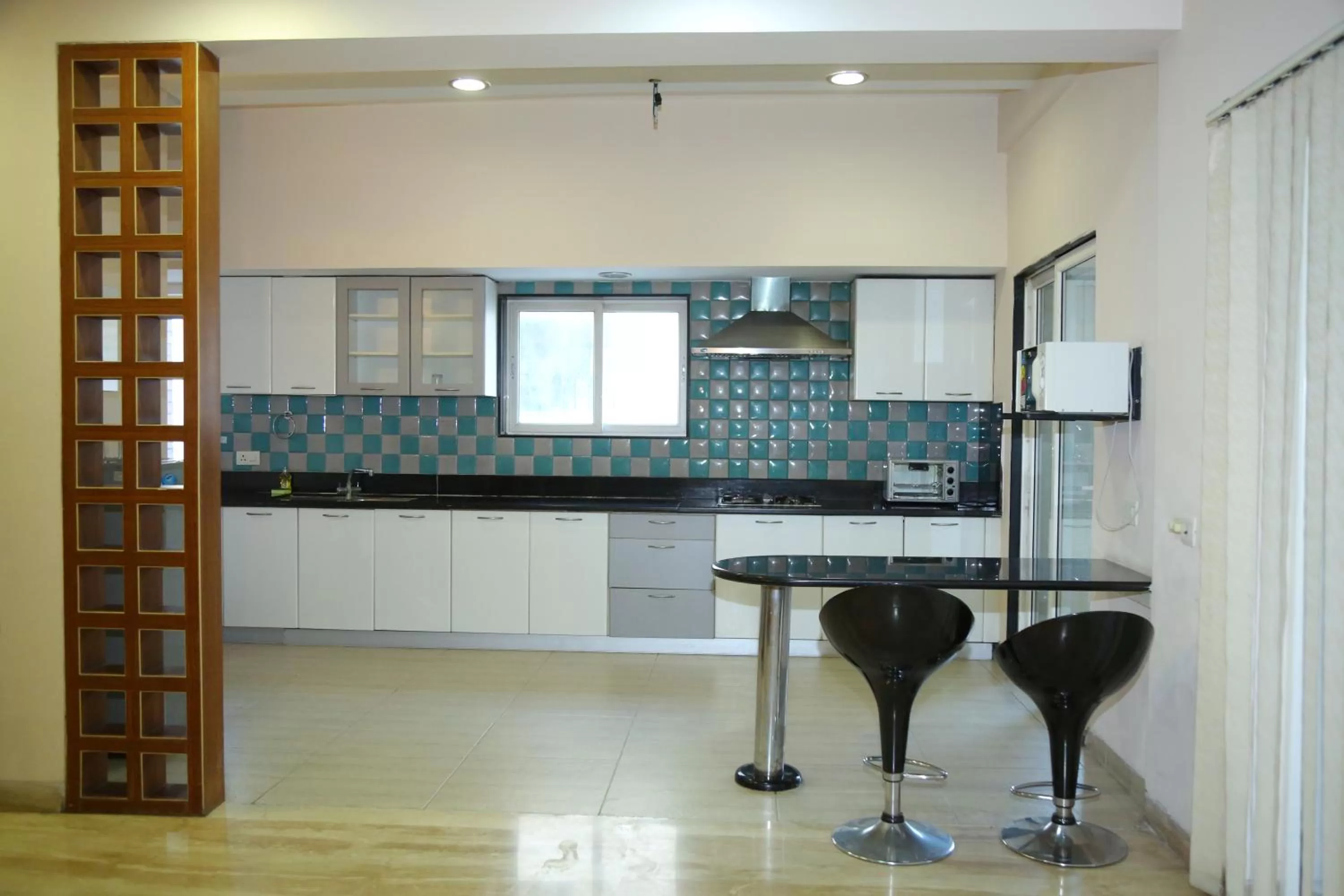 Kitchen or kitchenette in Swan Suites Madhapur