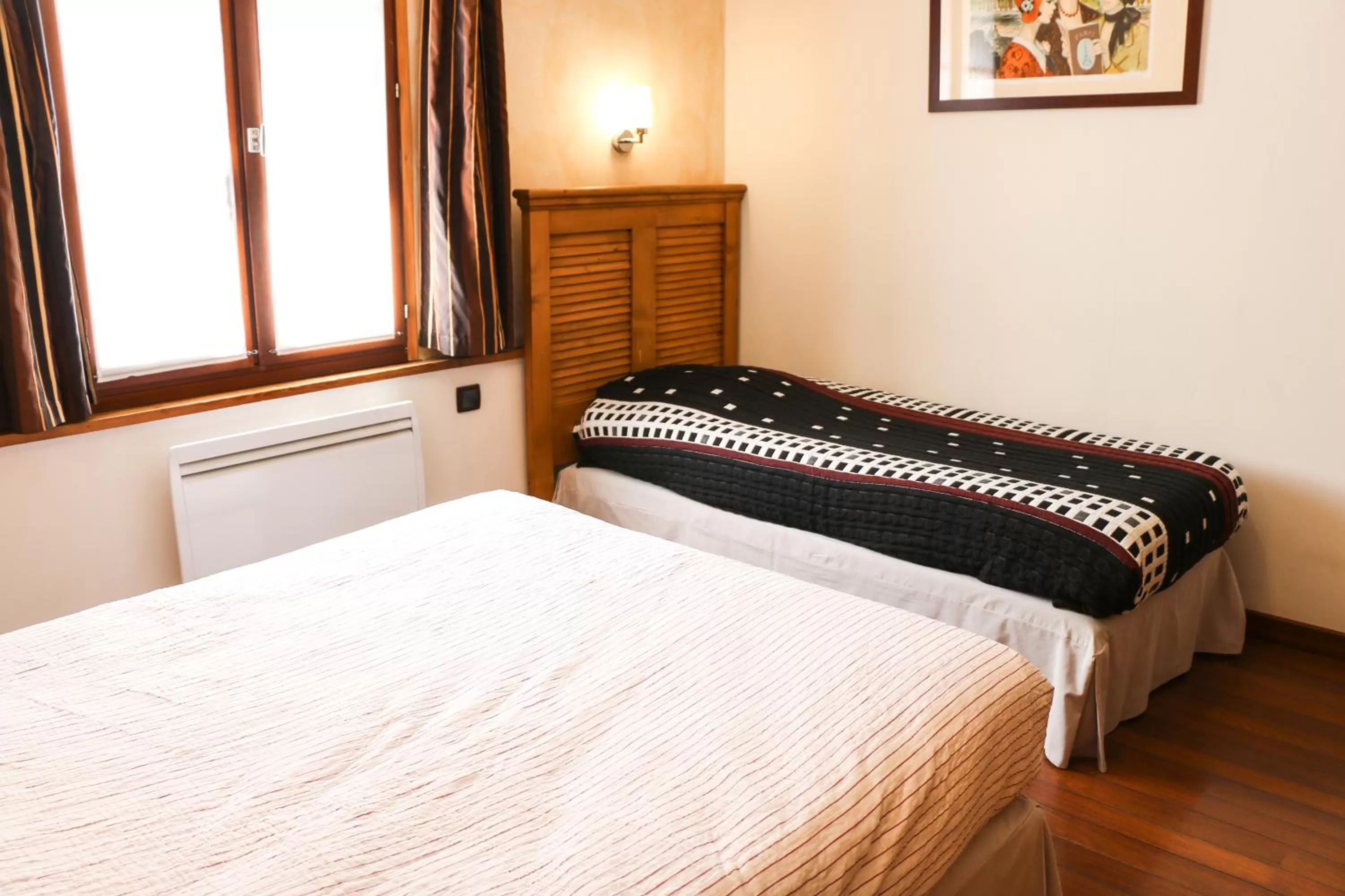 Bed in Auberge de la Vieille Ferme