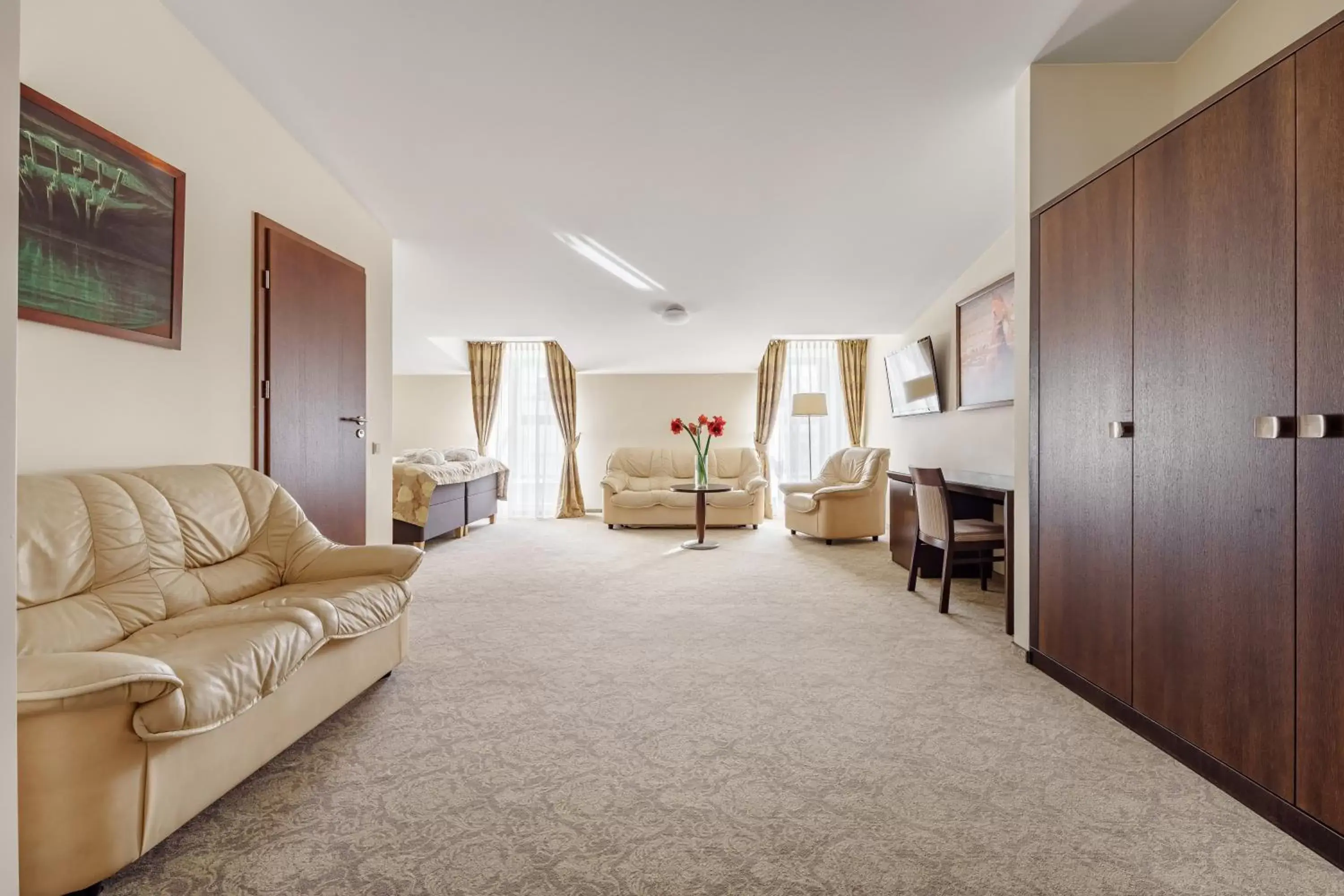 Bed, Seating Area in Euterpe Hotel