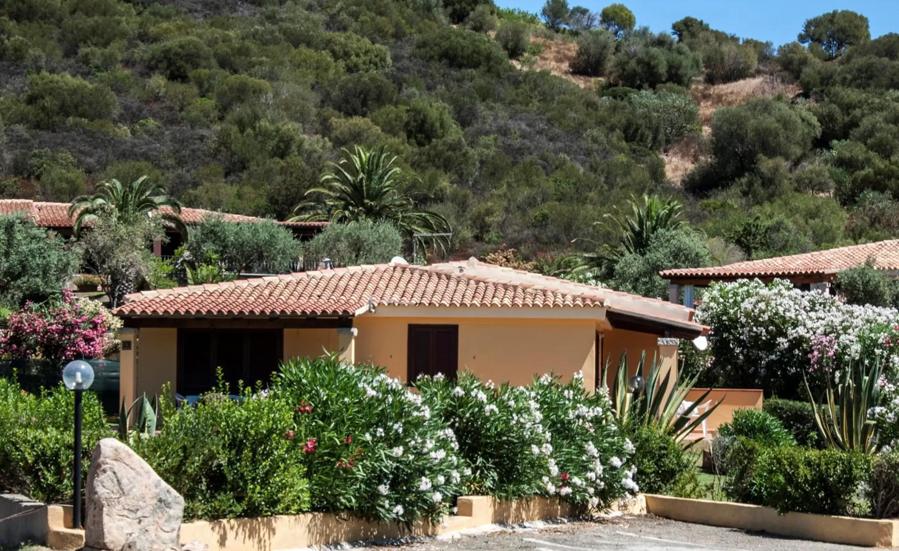 Facade/entrance, Property Building in Porto Ottiolu Resort