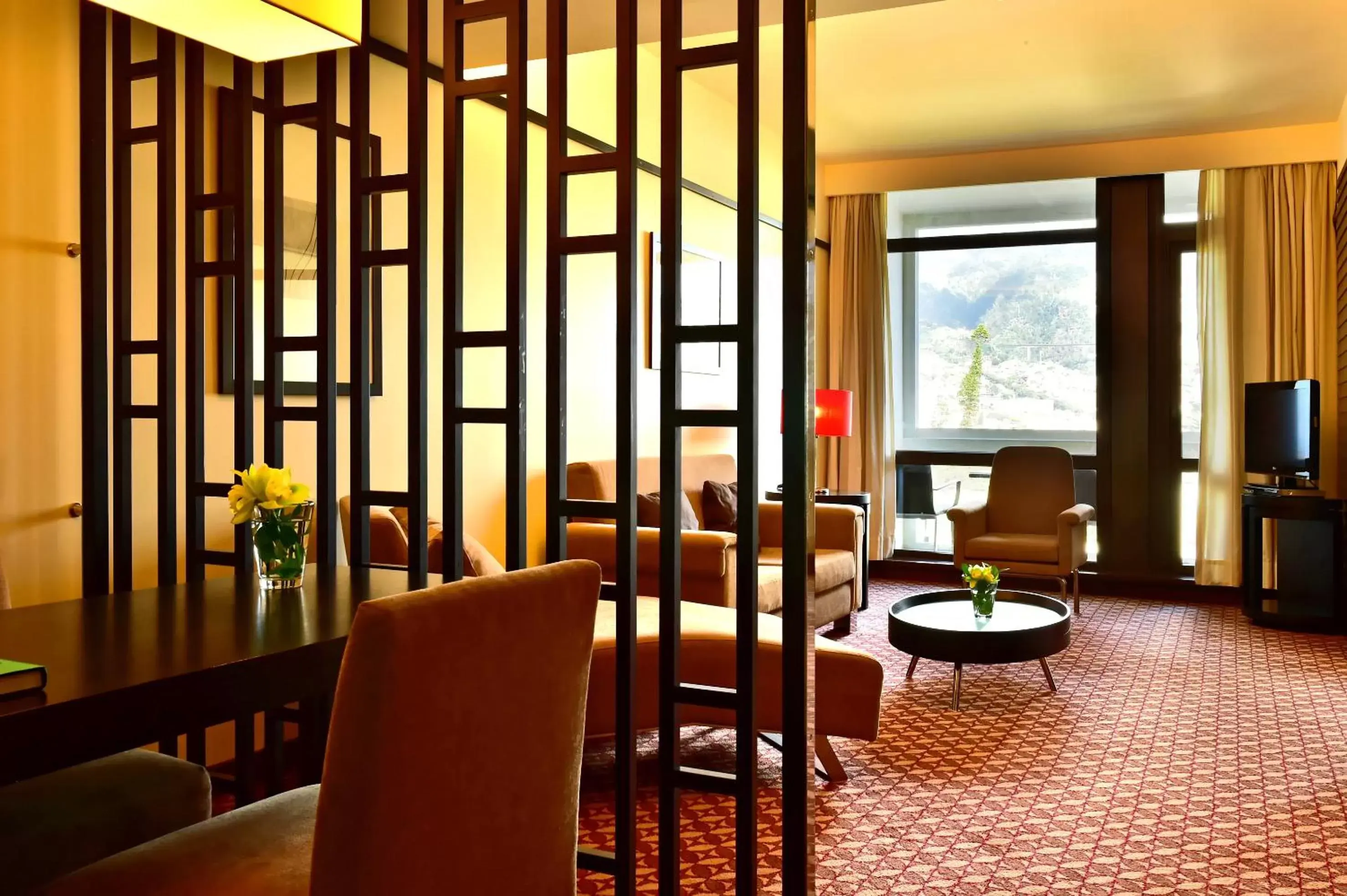 Living room in Pestana Casino Park Hotel & Casino Living room in Pestana Casino Park Hotel & Casino