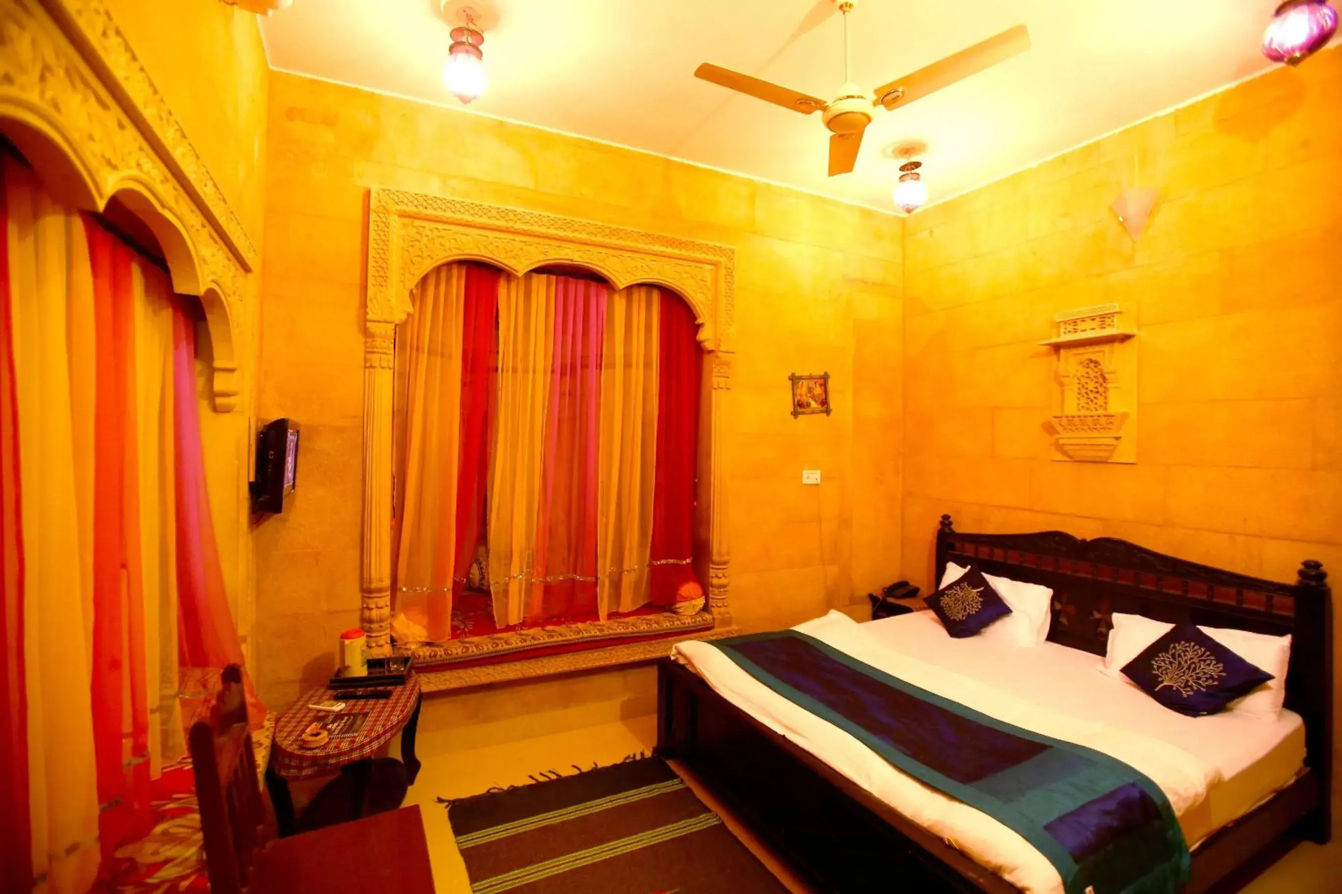 Bed in Hotel Royal Haveli