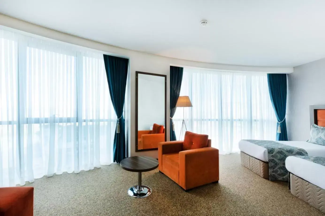 Bedroom, Seating Area in Sky Tower Hotel