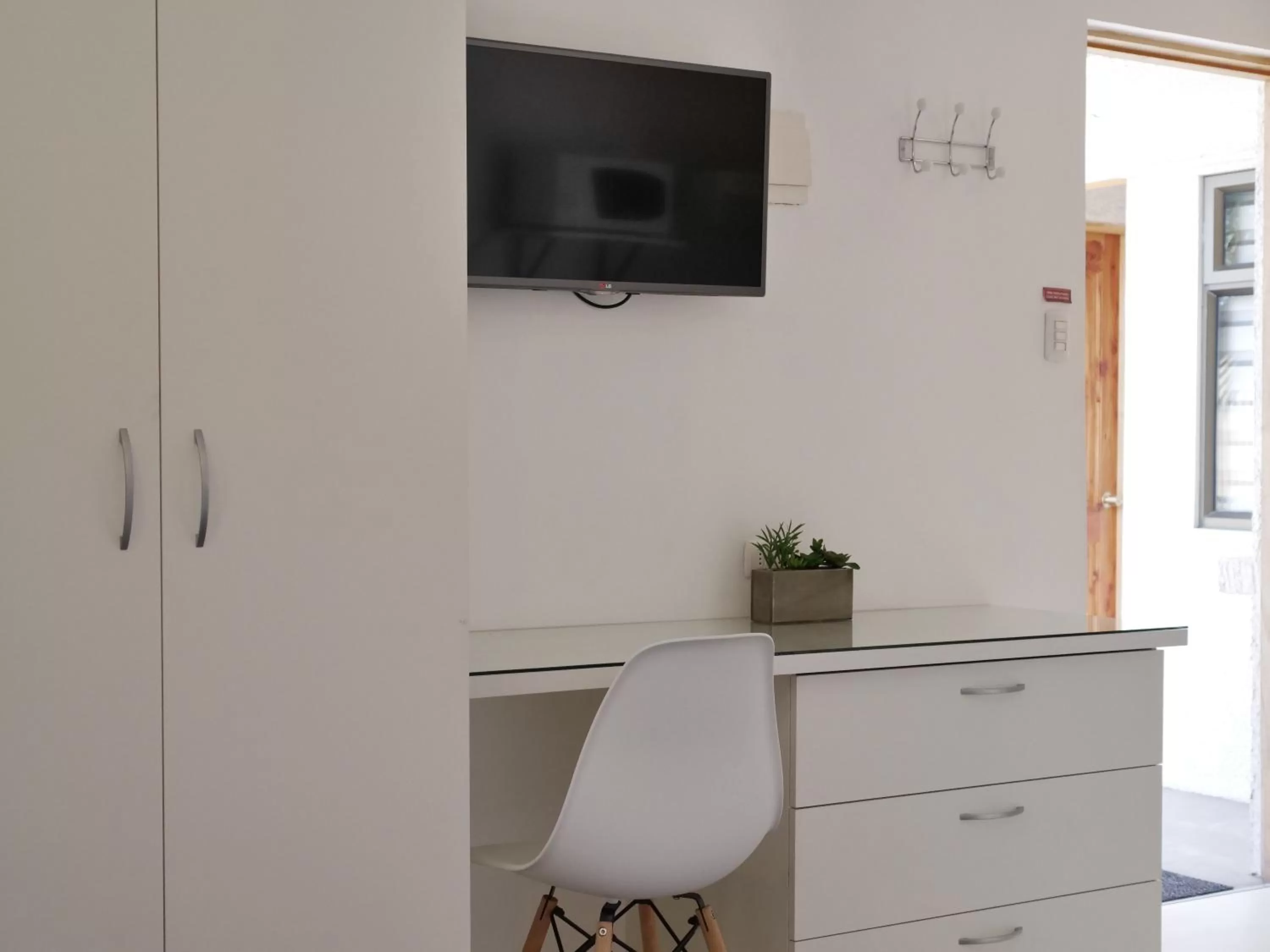 TV/Entertainment Center in Hotel La Fuente