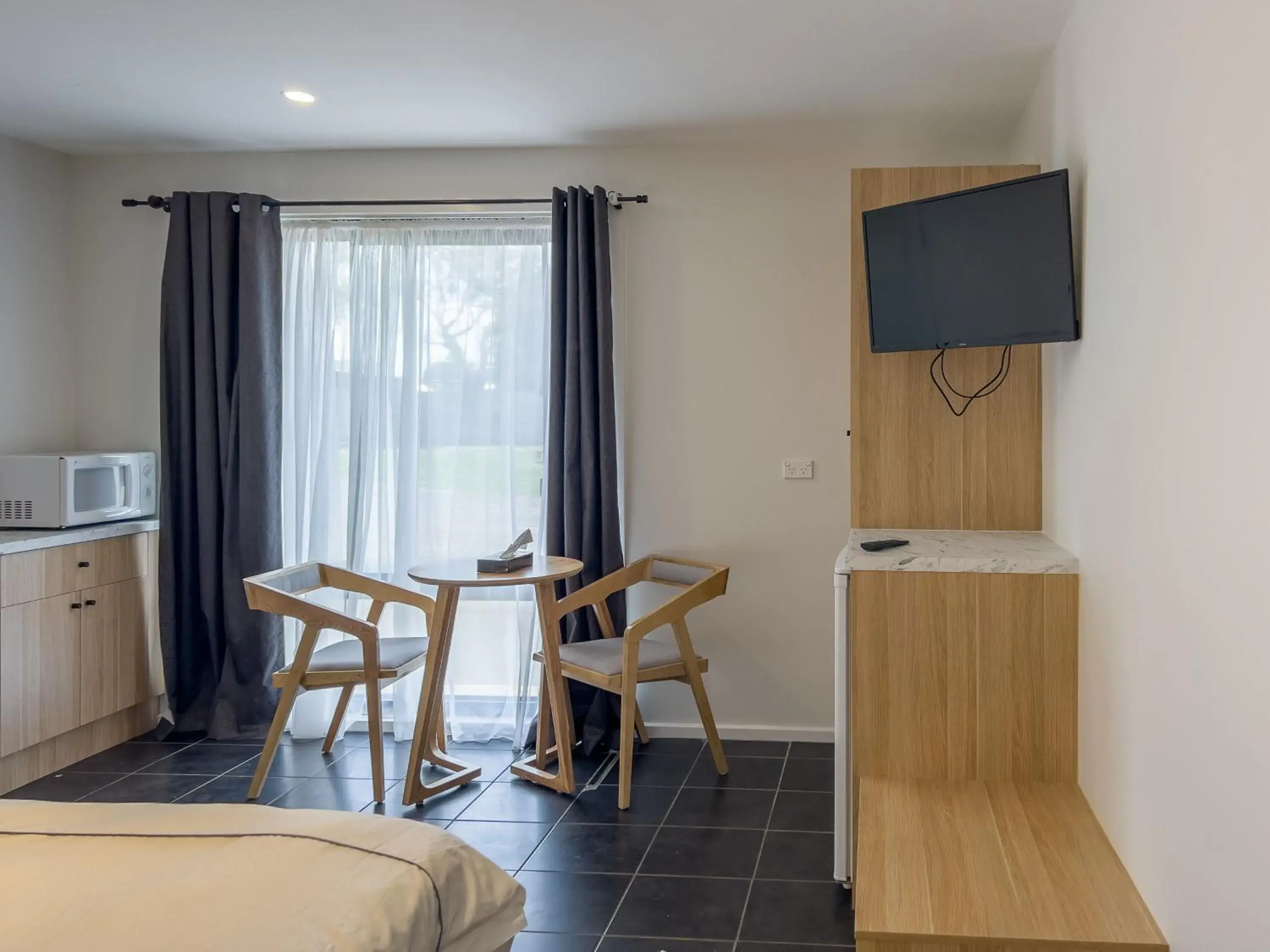TV and multimedia, TV/Entertainment Center in A1 Motels and Apartments Port Fairy