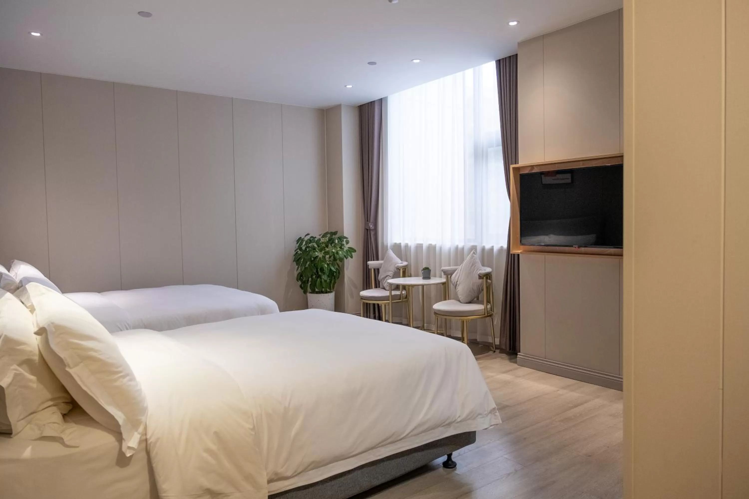 Bed in Shanghai JOYFUL YARD Hotel-Free shuttle bus to Pudong Airport and Disneyland
