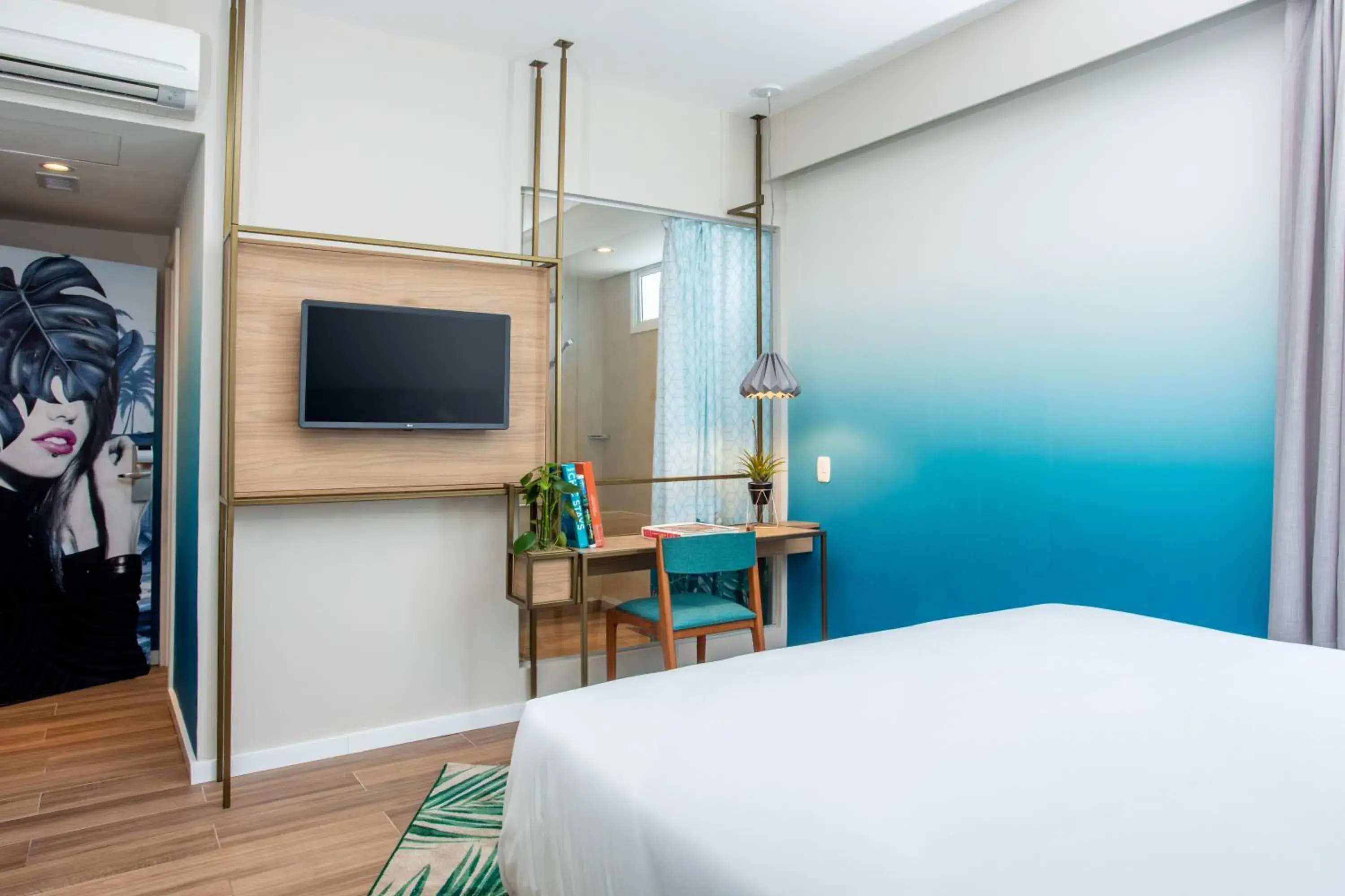 Bedroom, TV/Entertainment Center in Mercure Rio Boutique Hotel Copacabana