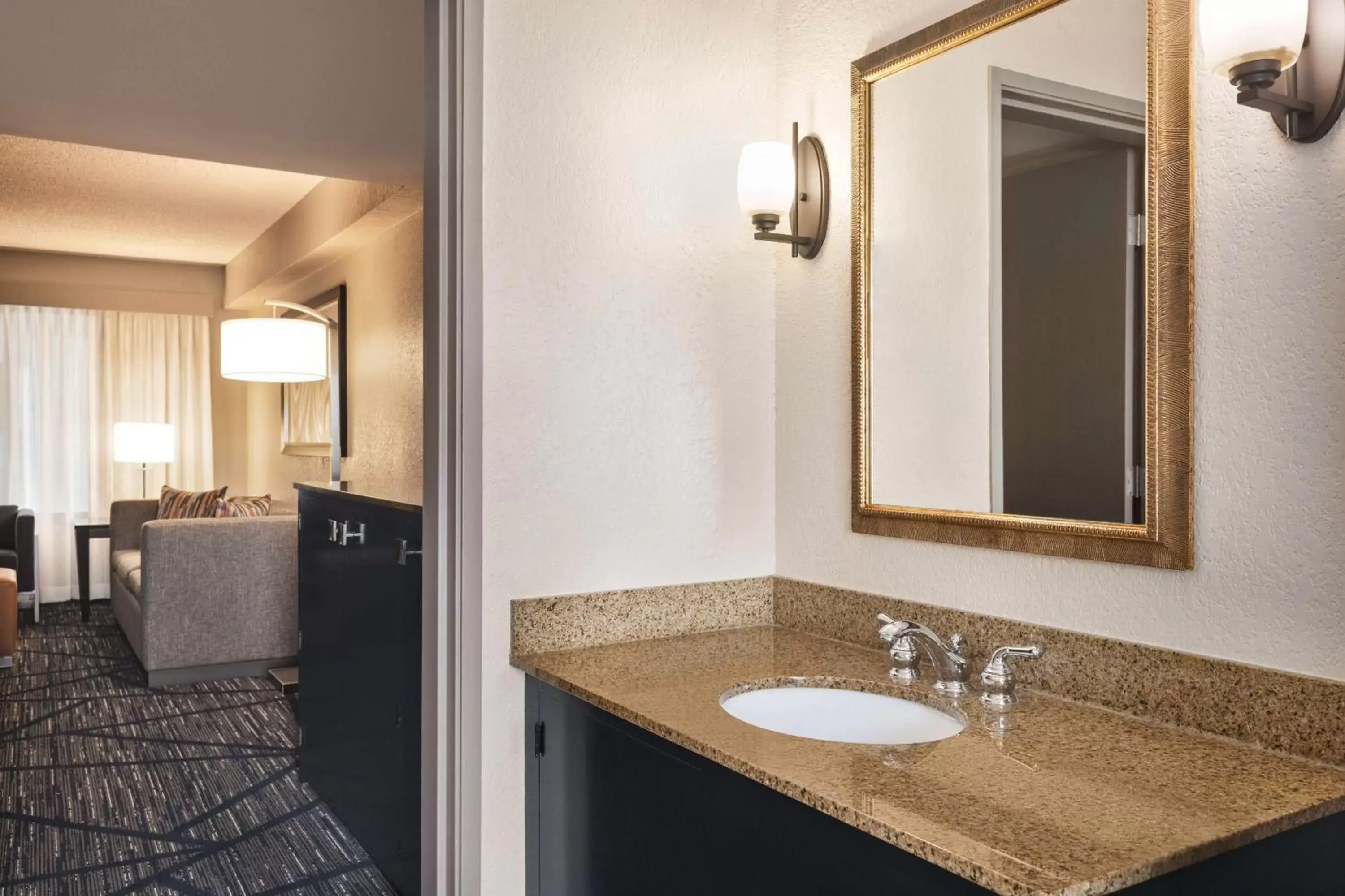 Living room, Bathroom in Embassy Suites by Hilton Miami International Airport