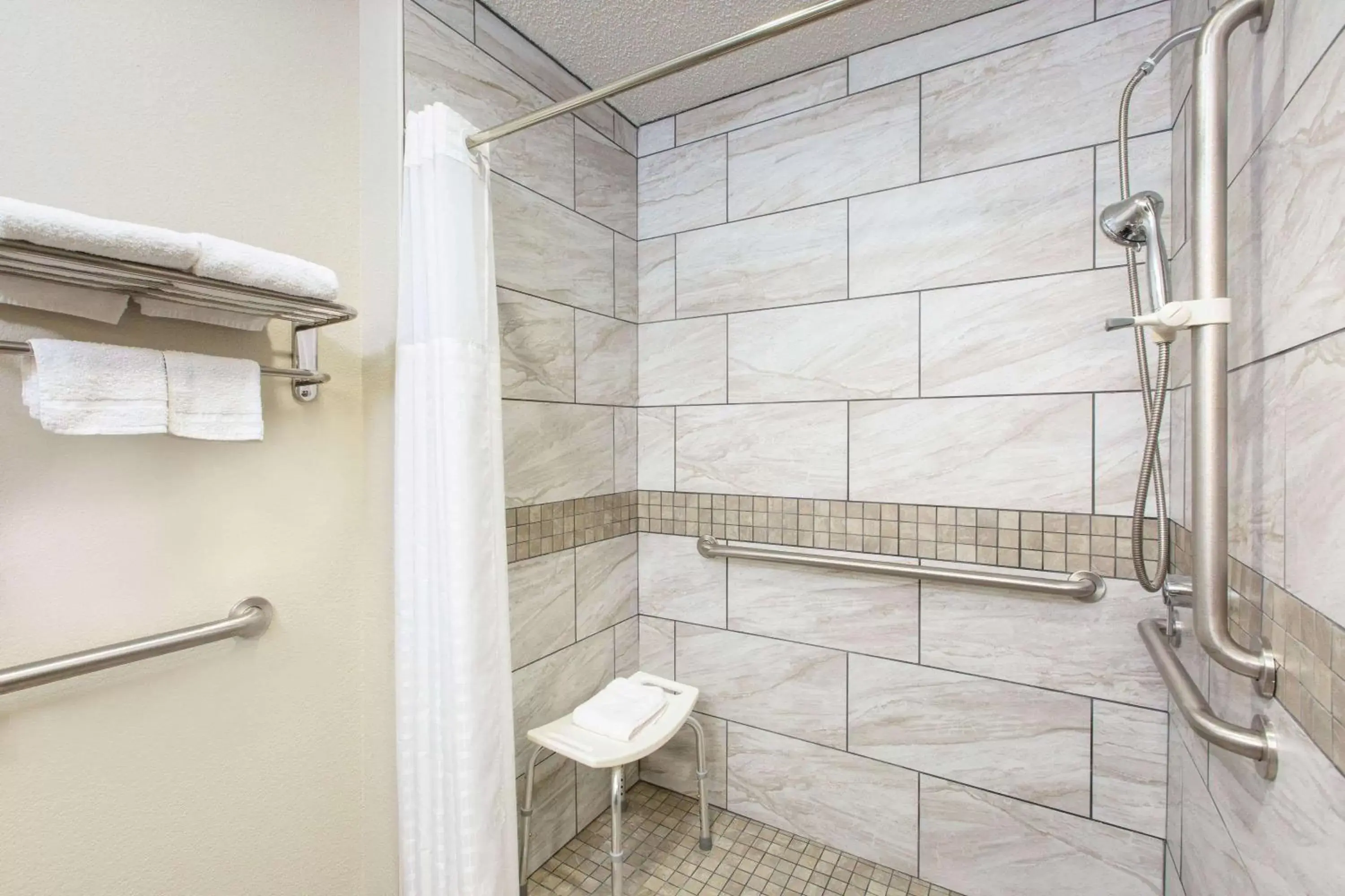 Bathroom in Days Inn & Suites by Wyndham Wisconsin Dells