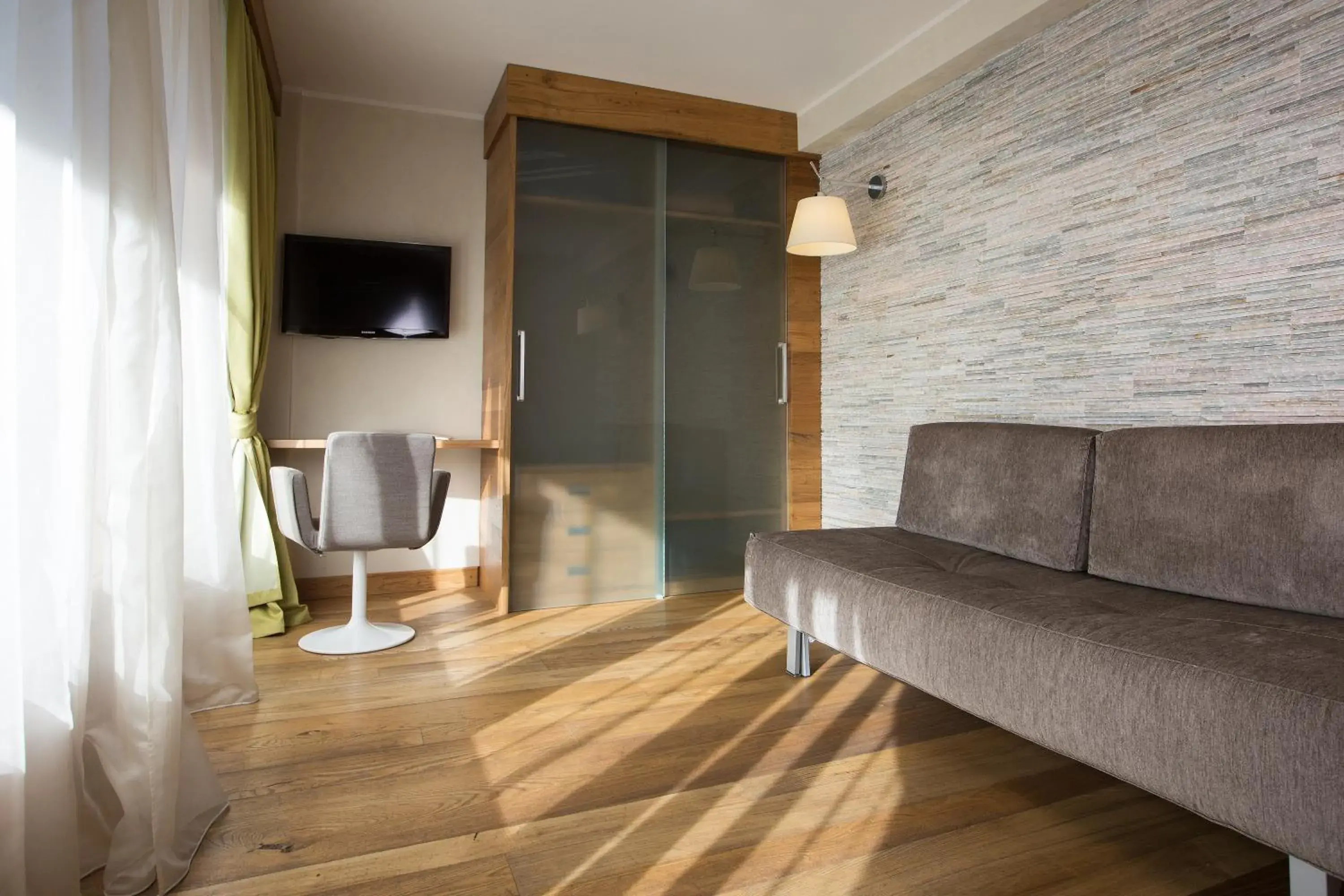 TV and multimedia, Seating Area in Sottovento Luxury Hospitality