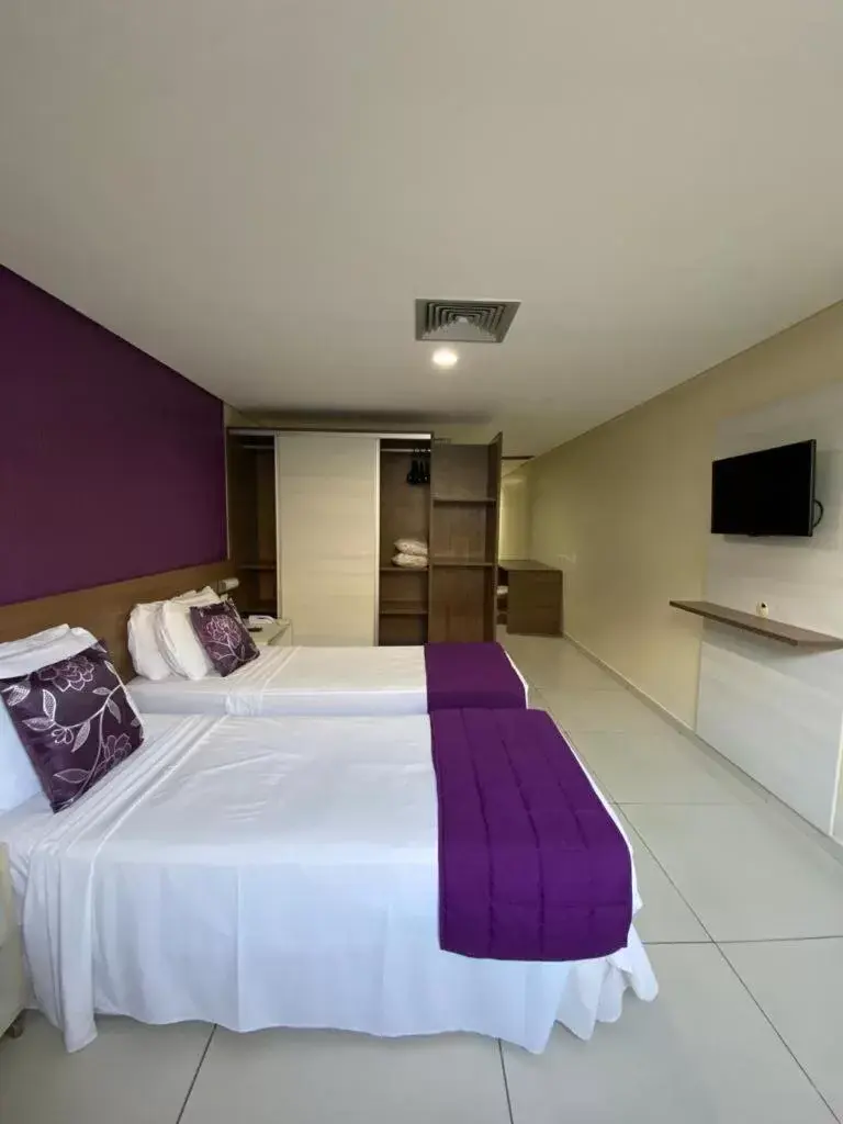 Photo of the whole room, Bed in Nobile Suítes Tambaú