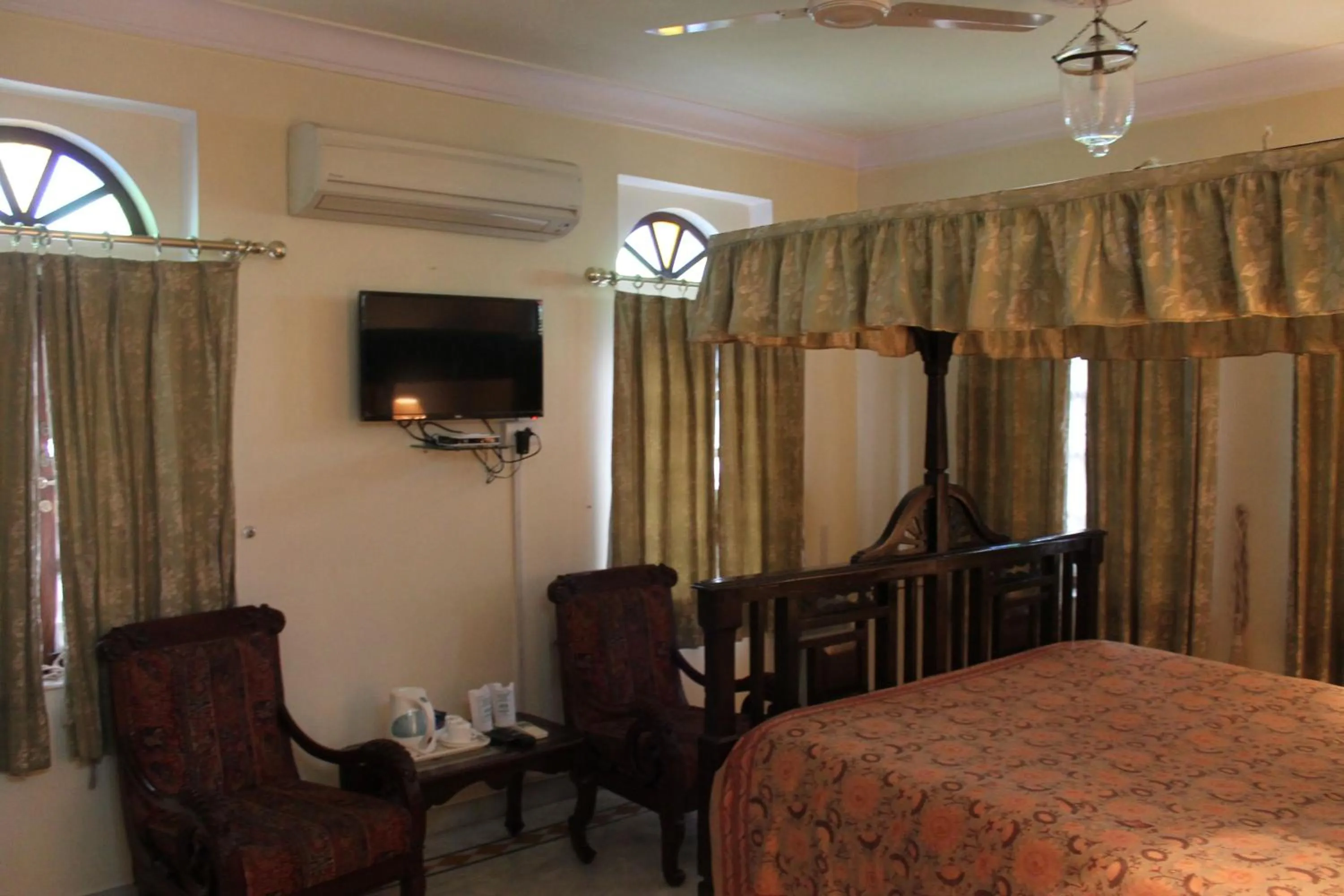 Photo of the whole room, Bed in Madhuban - A Heritage Home