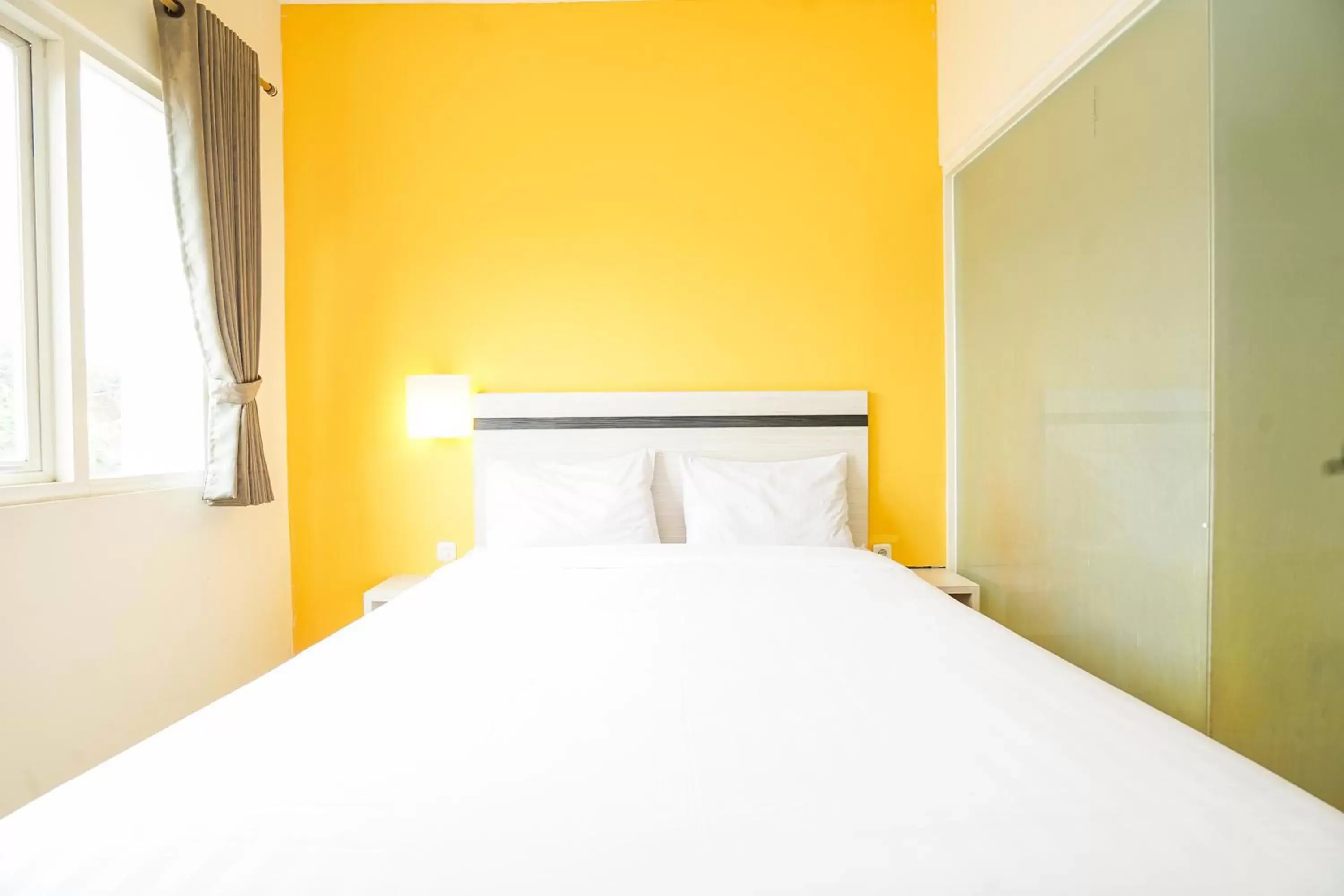 Bed in Pratisarawirya Guesthouse by ecommerceloka Bed in Pratisarawirya Guesthouse by ecommerceloka