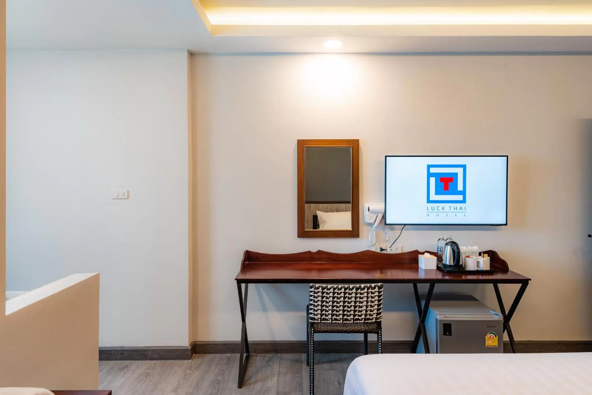 Bedroom in Luck Thai Hotel