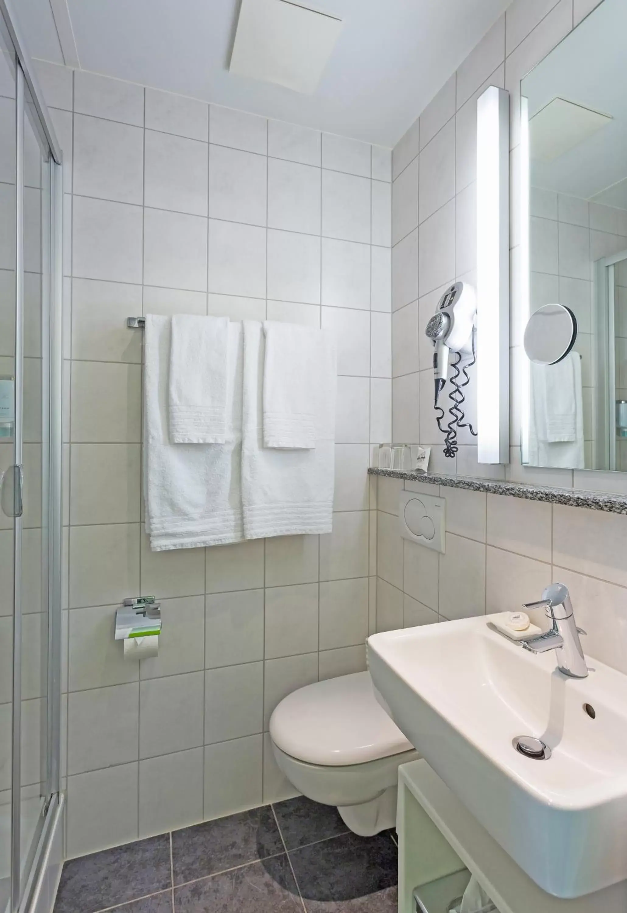 Bathroom in Hotel City Inn Basel