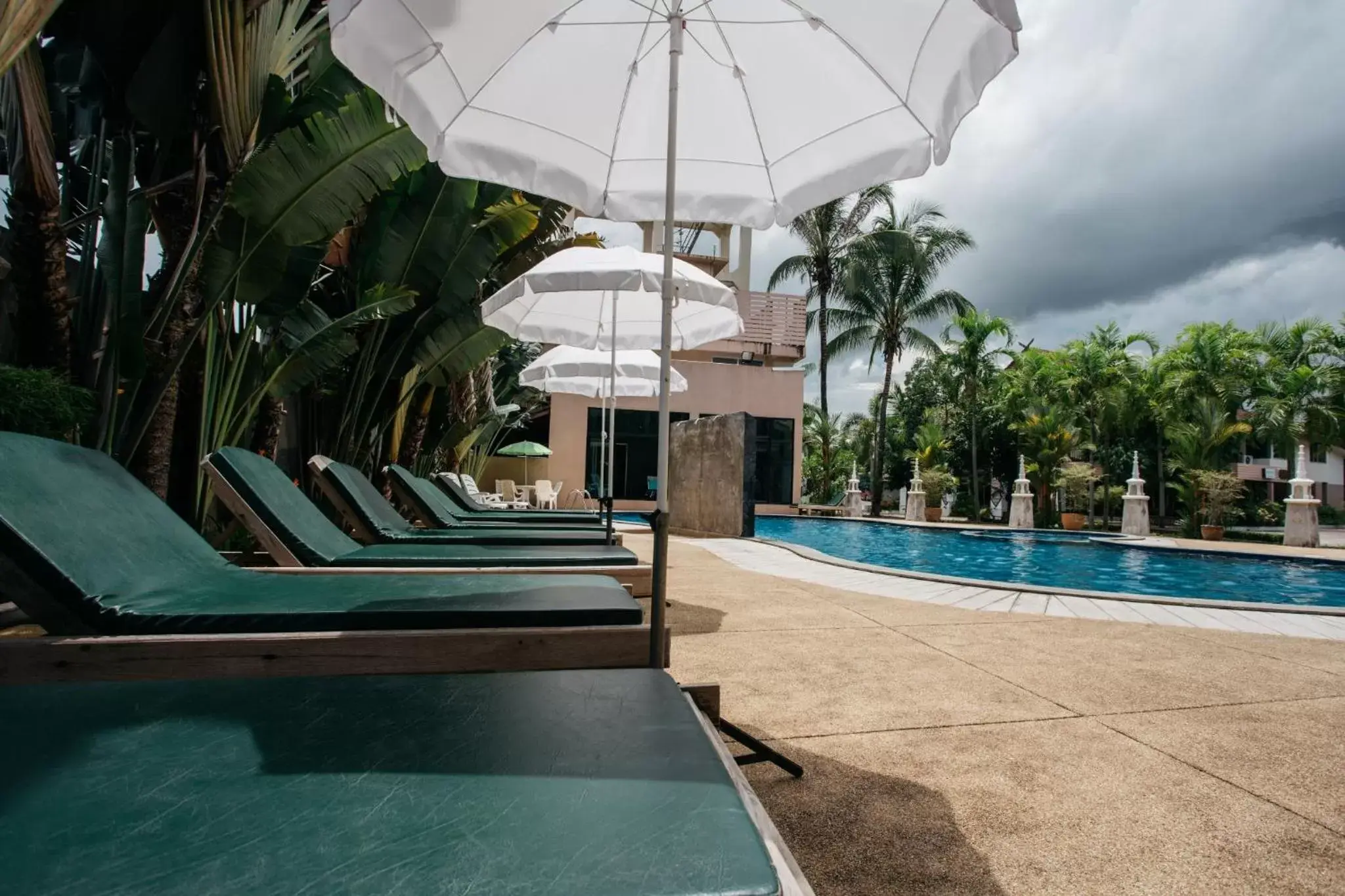 Swimming pool in Diamond Park Inn Chiangrai & Resort Swimming pool in Diamond Park Inn Chiangrai & Resort