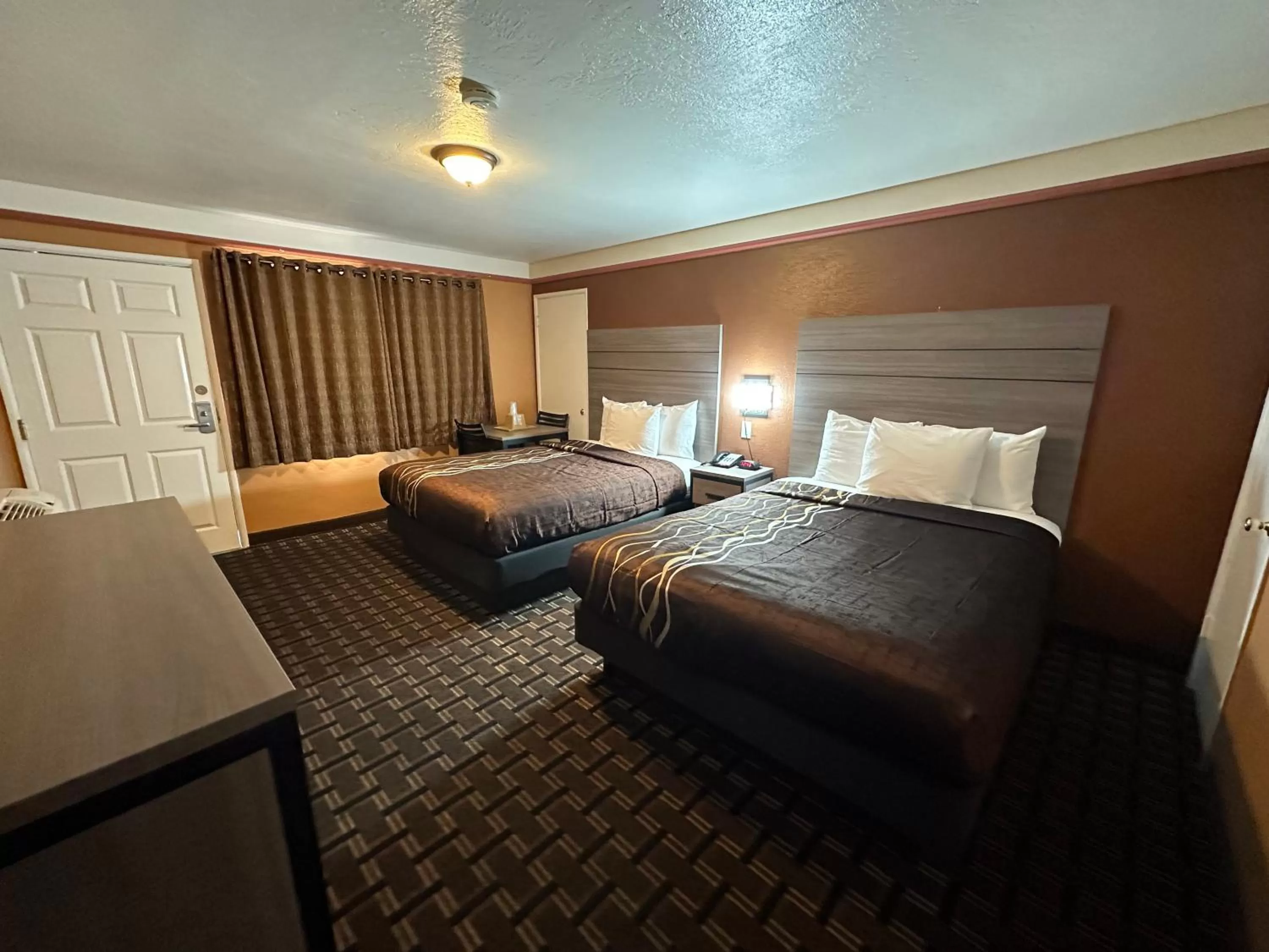 Bed in New Corral Motel